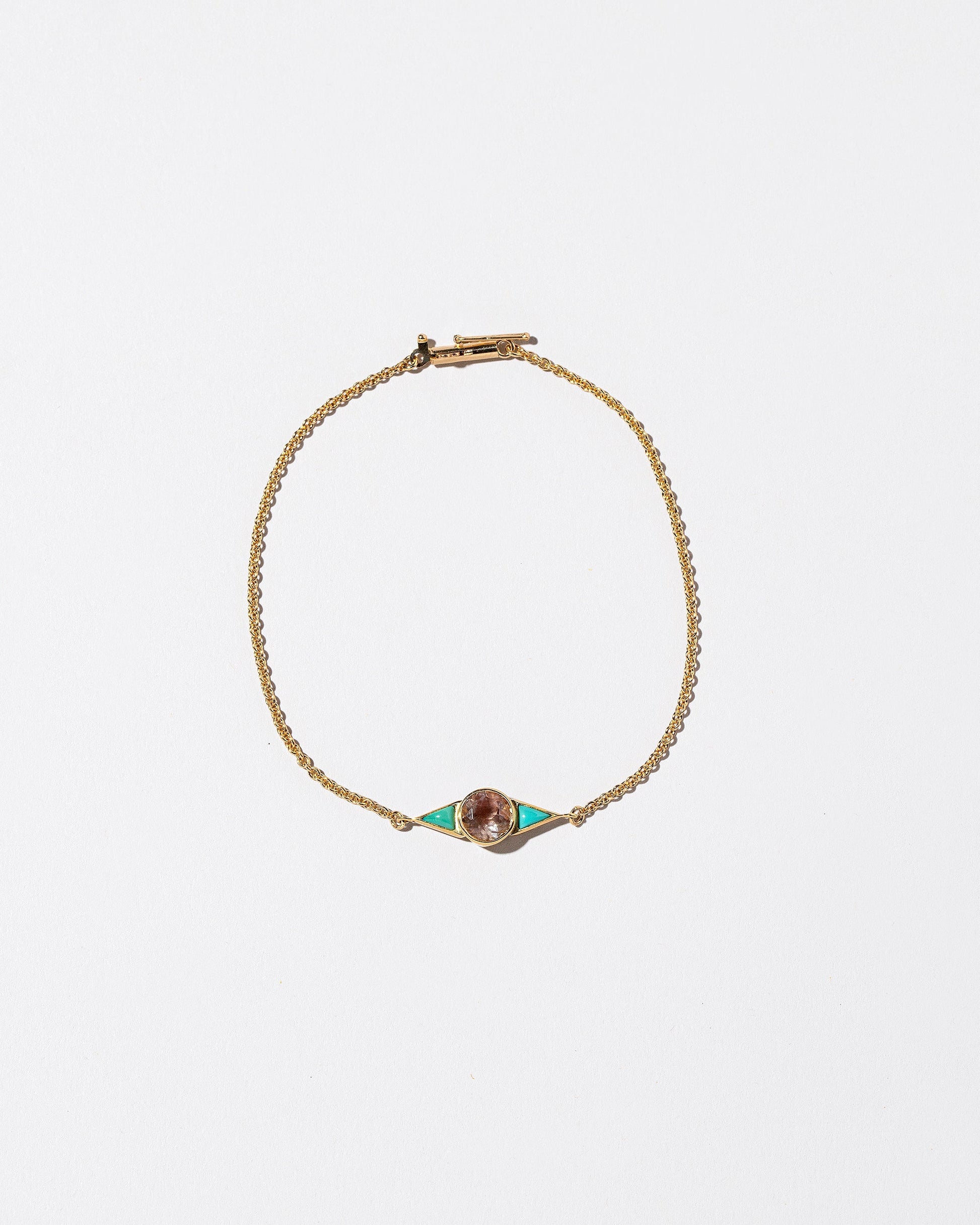  Sunstone & Turquoise Eye Bracelet on light color background.