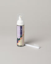 Mociun Jewelry Cleaner & Brush on light color background.