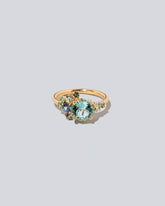 Tourmaline Vega Ring on light color background.