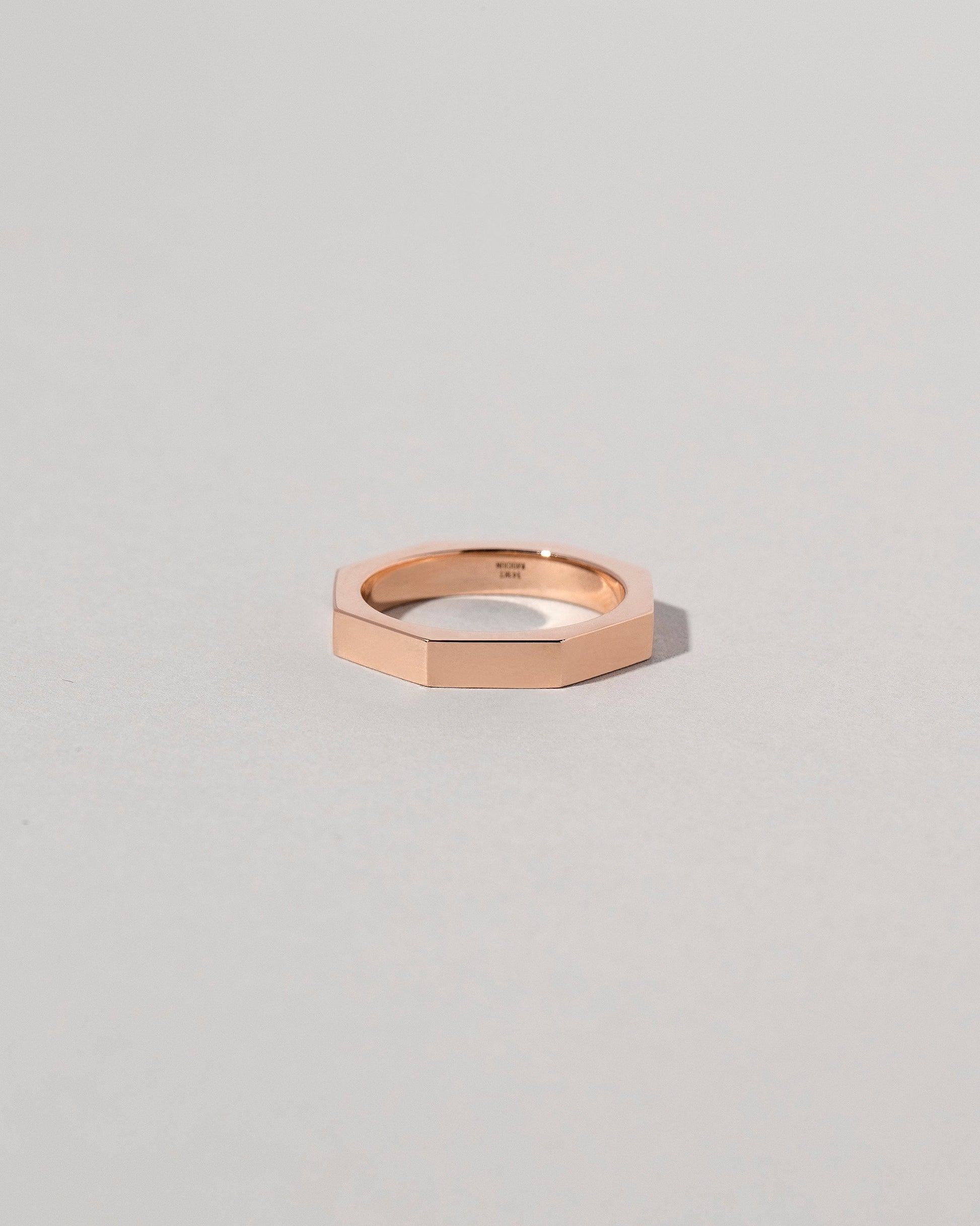 Rose Gold 3mm Segmented Band on light color background.