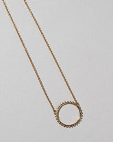 Sunbow Necklace on light colored background.