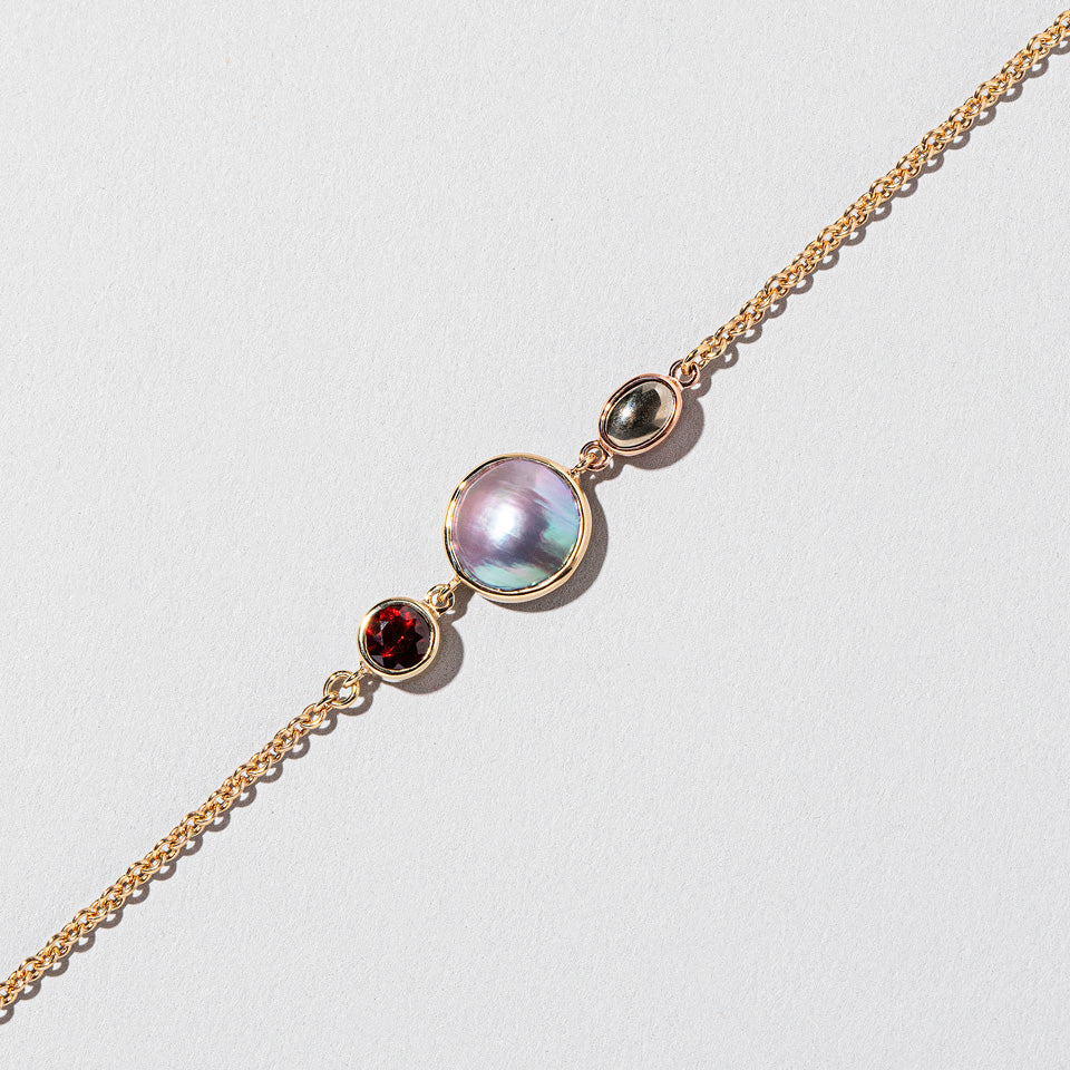 product_details:: Act 3. Bracelet 5 on light color background.