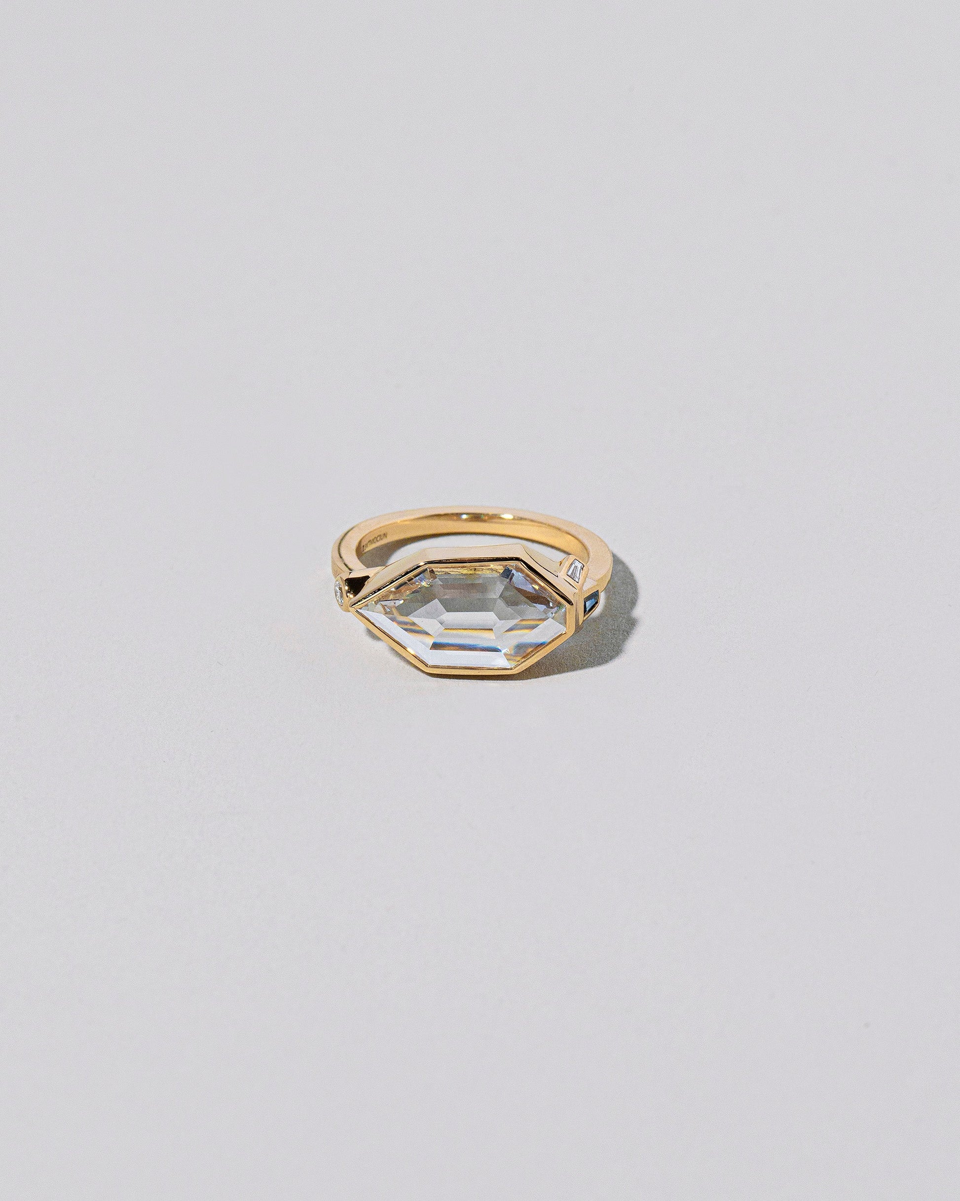  Okama Ring on light color background.