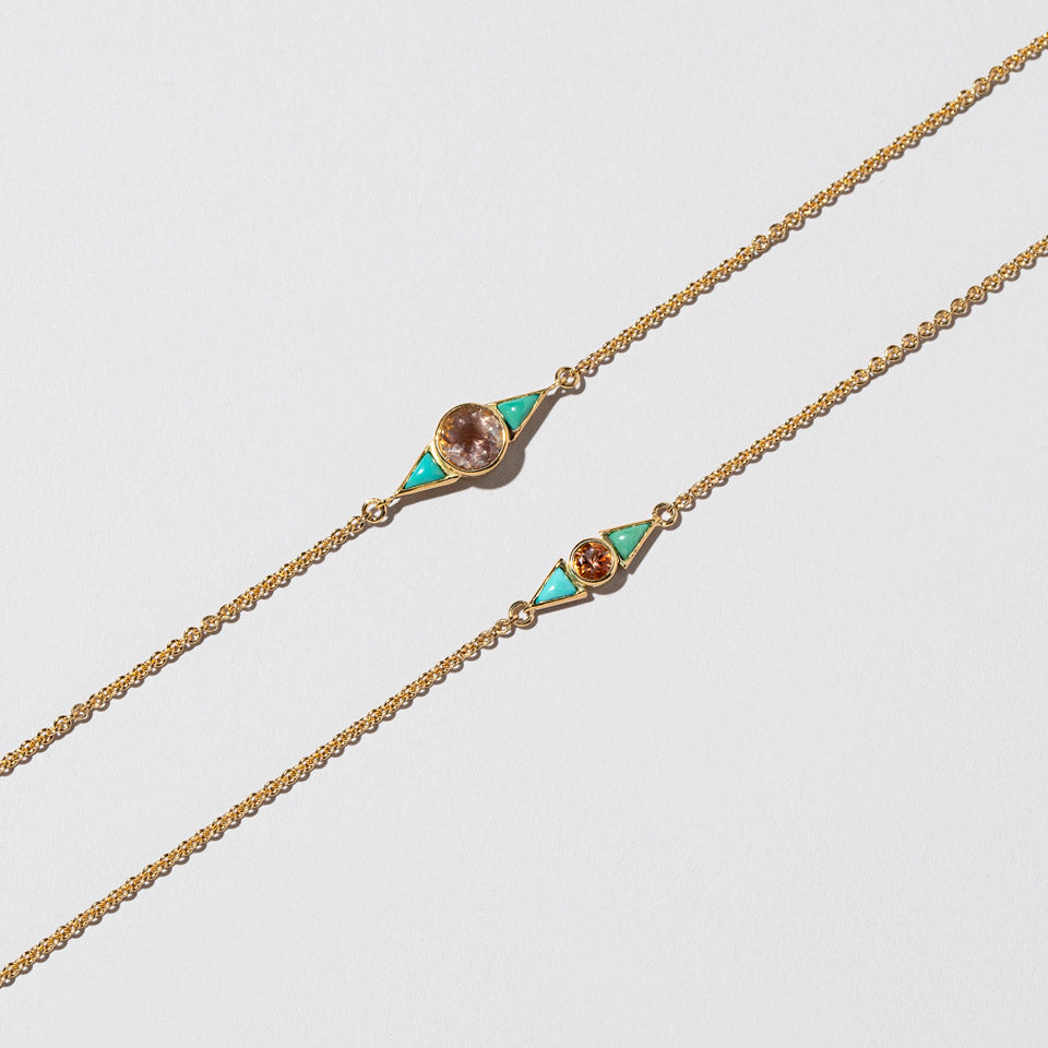 product_details:: Sunstone & Turquoise Eye Bracelets on light color background.