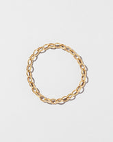 Endless Clasp Bracelet on light color background.