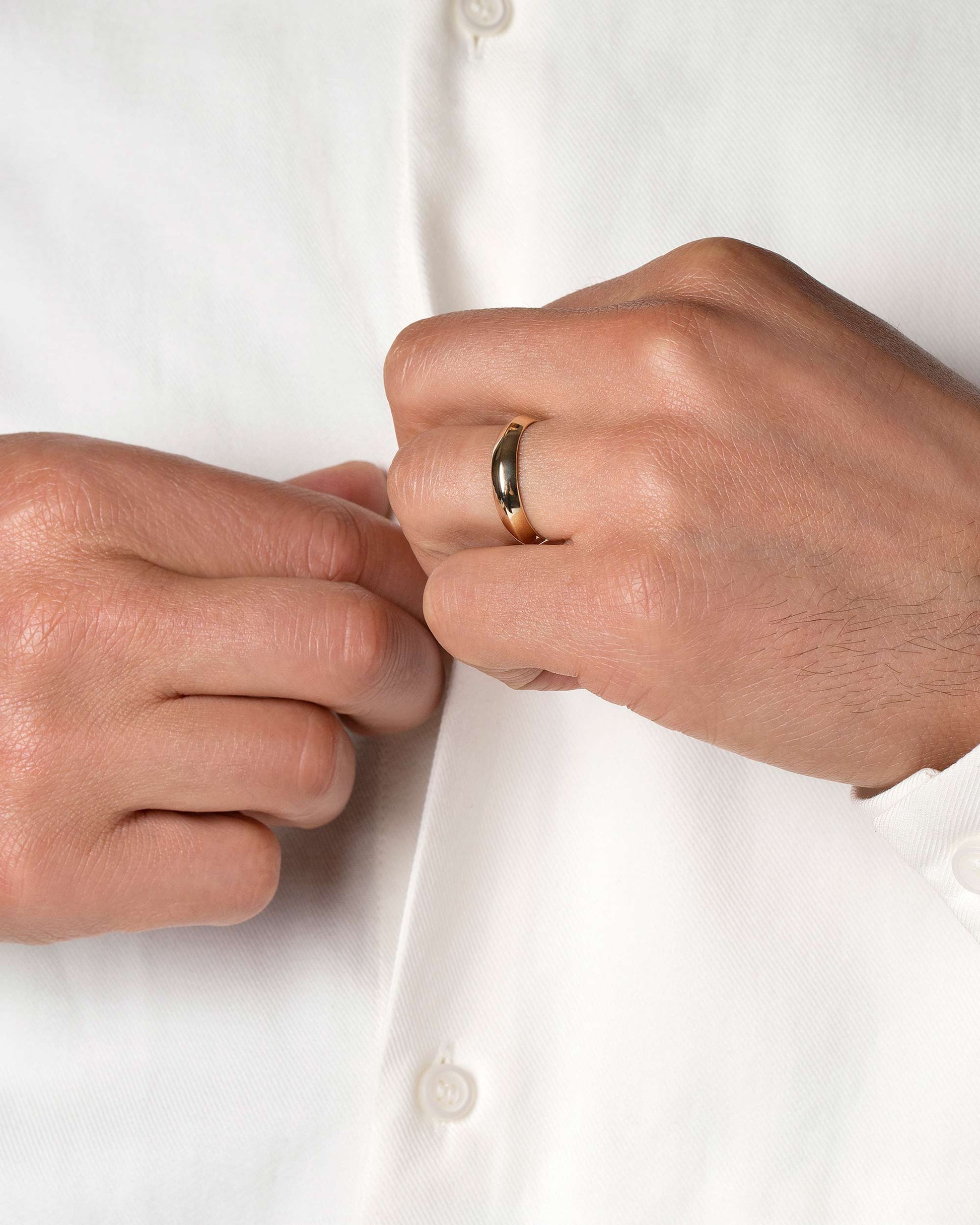 Gold 5mm Knife Edge Band on model.