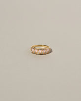  Five Triangle Ring - Pink Opal on light color background.