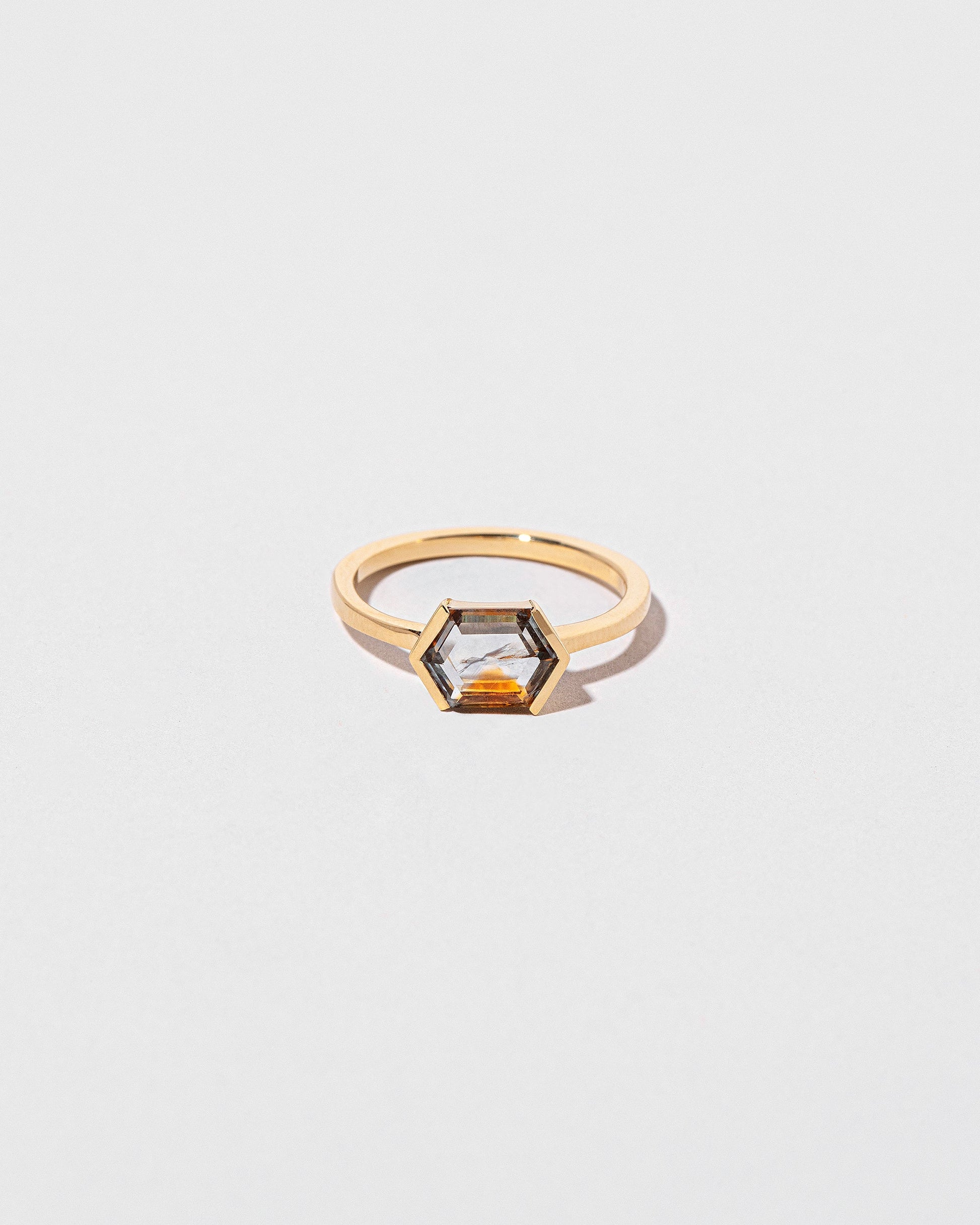 Amber Ring on light color background.