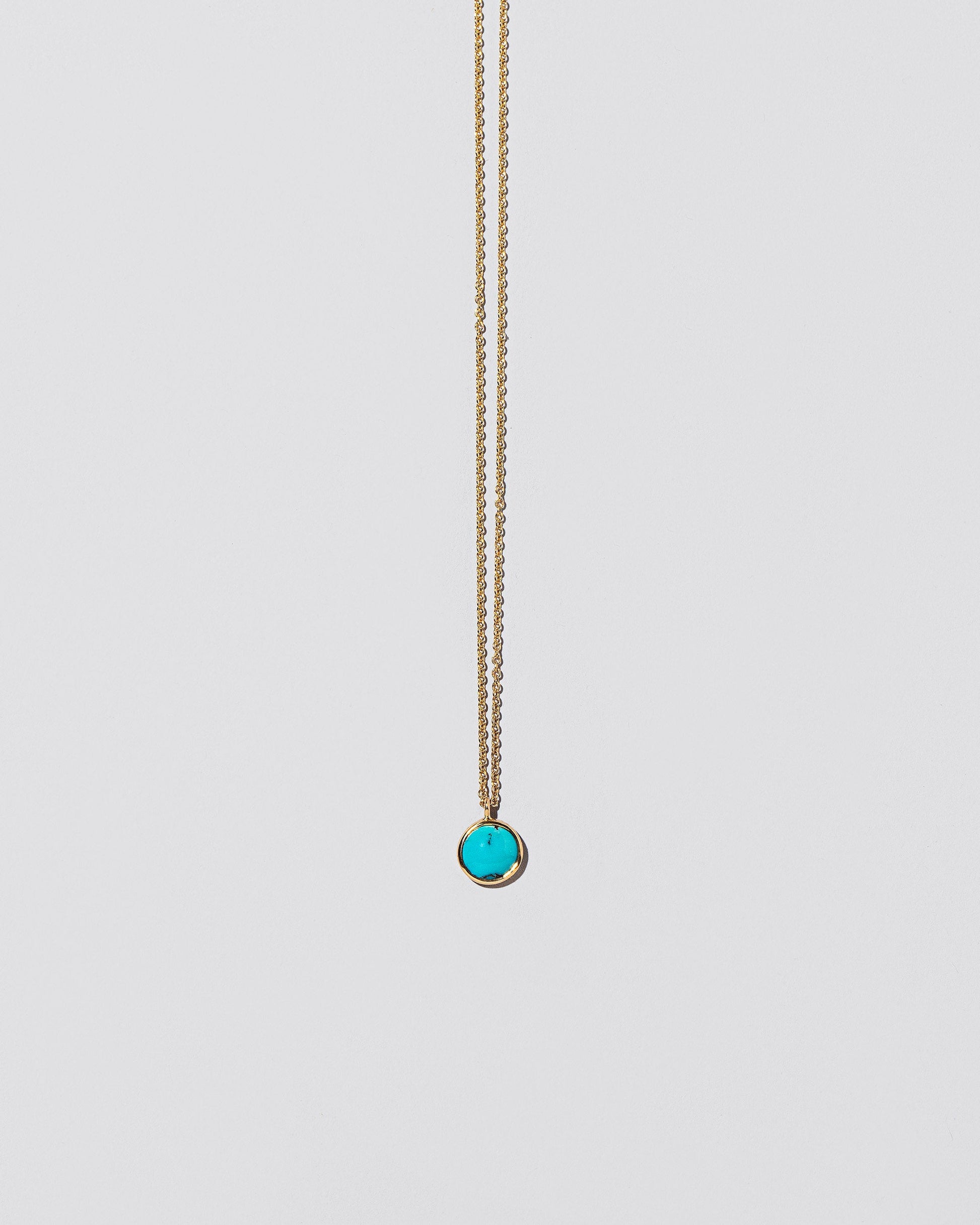 Wisdom Necklace on light color background.