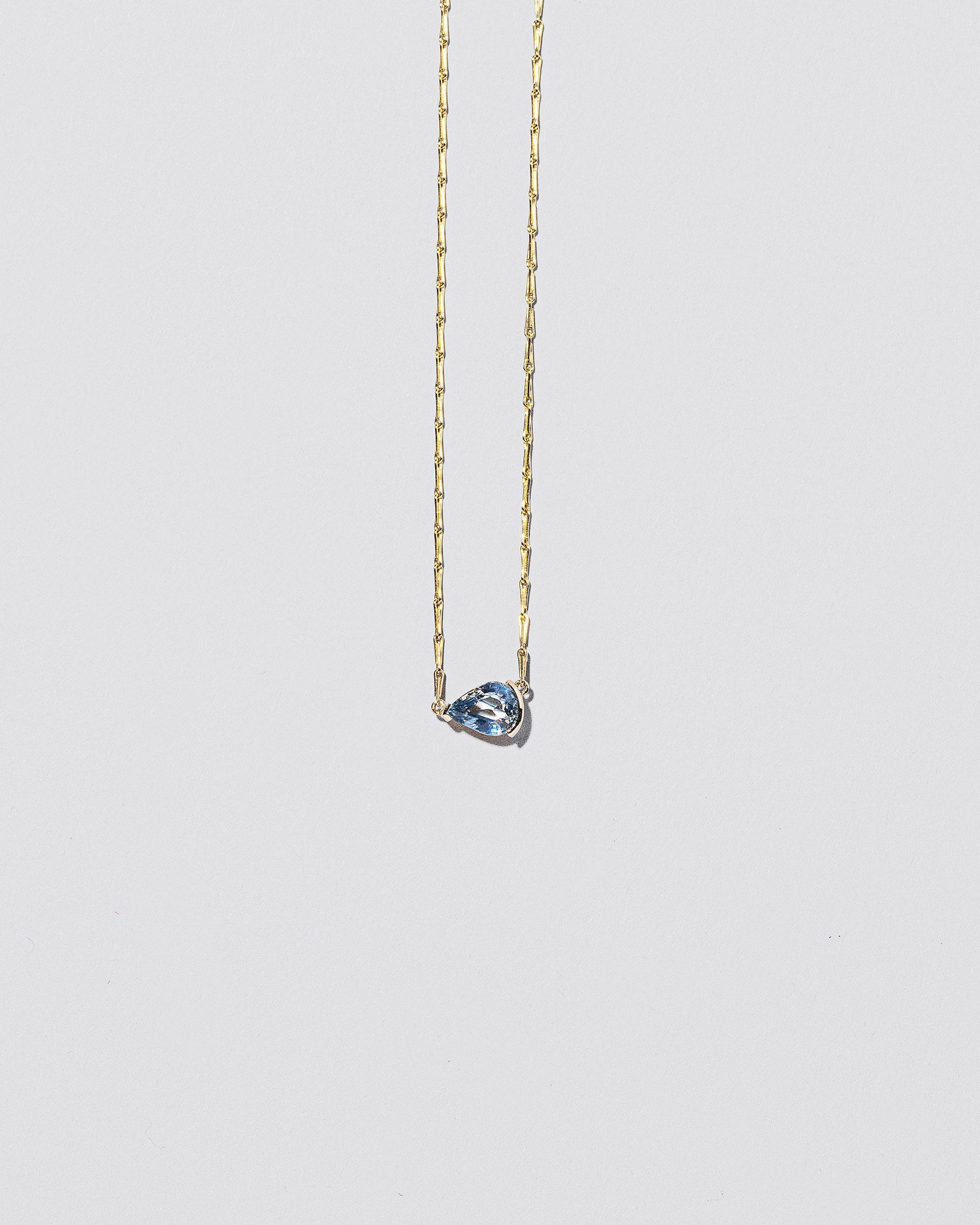  Say Yes Necklace on light color background.