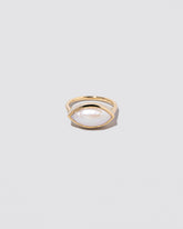 Triton Ring on light color background.