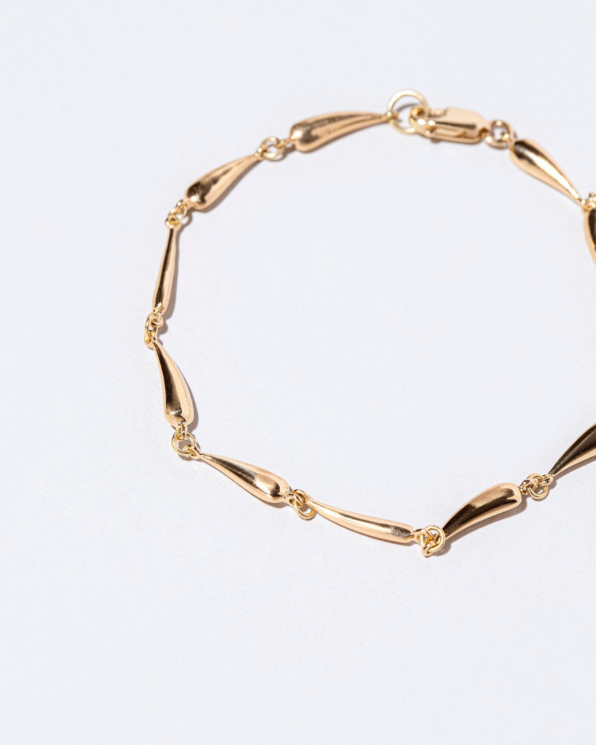  Accumulation Bracelet on light color background.