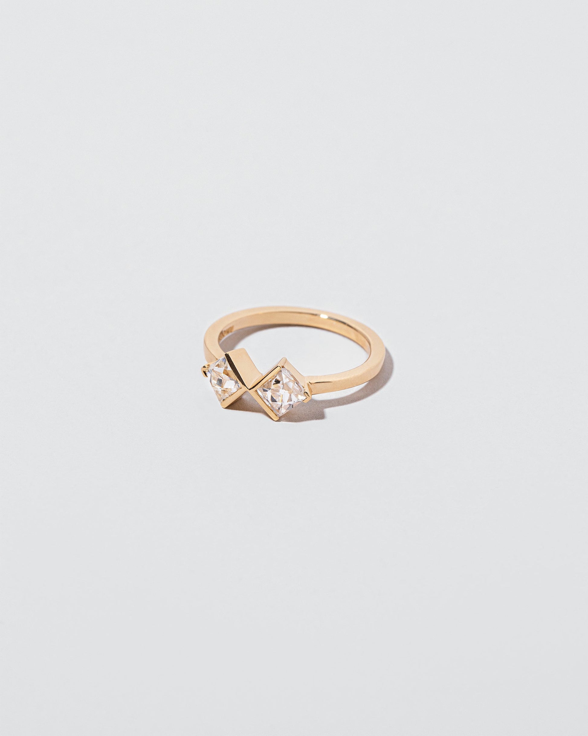  Rise & Fall Ring on light color background.