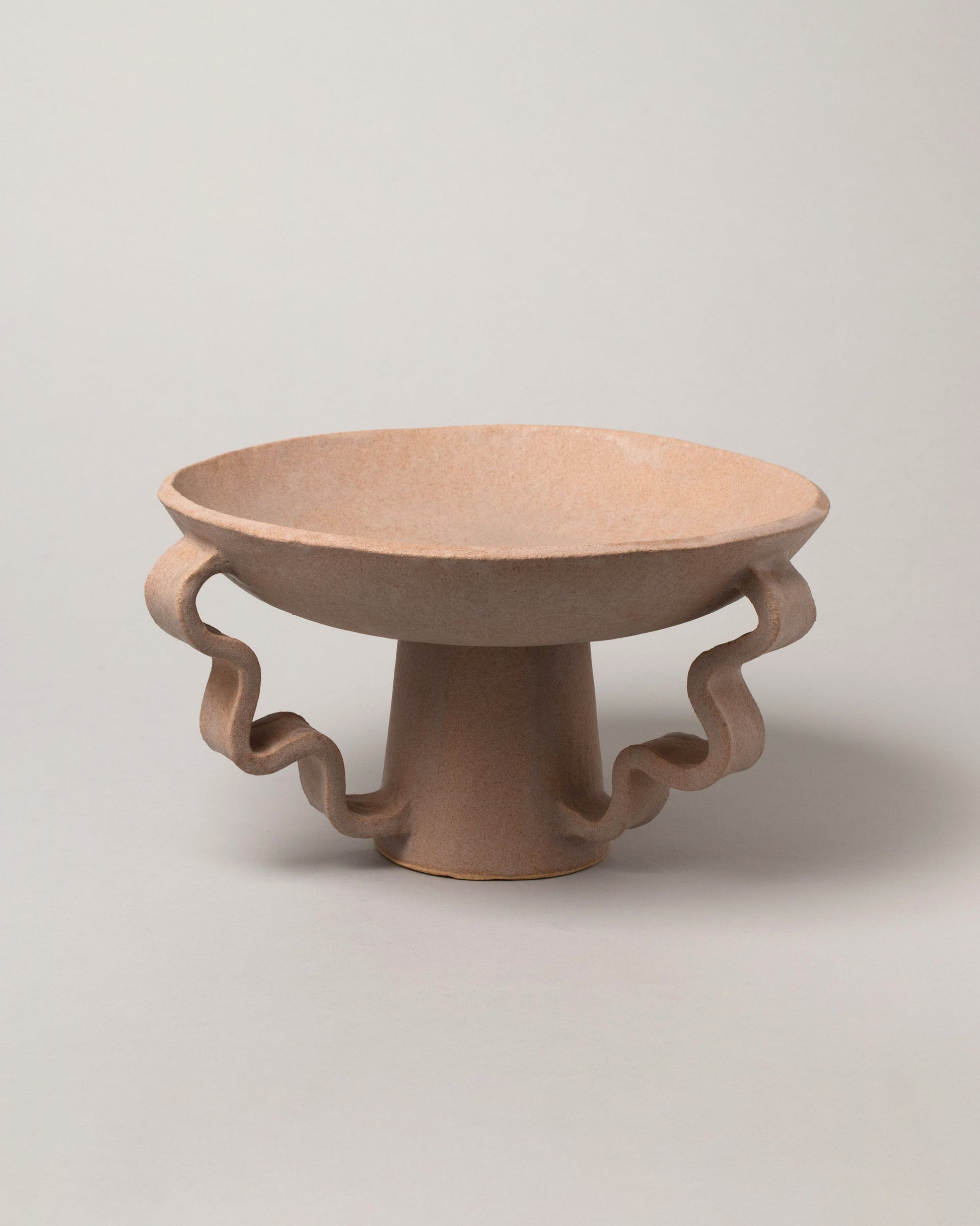 Morgan Peck Mauve Stretch Bowl on light color background.