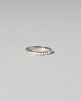 Platinum Etched Infinity Pattern Band on light color background.