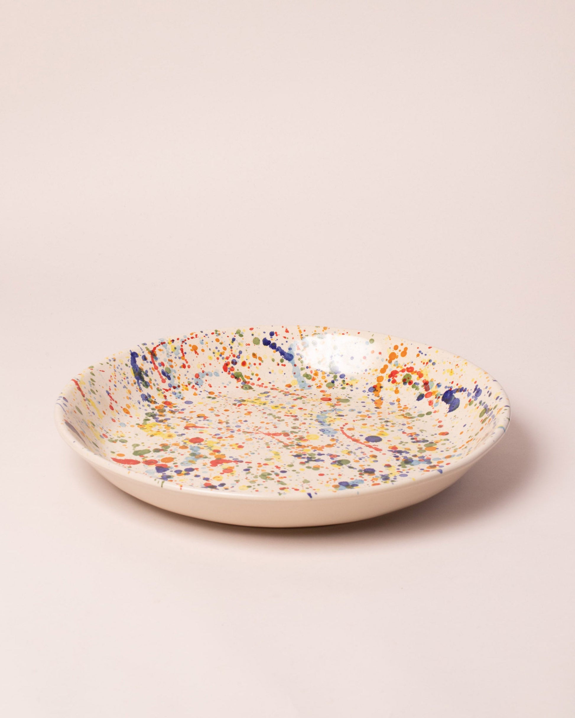  Del Monaco Circular Serving Dish on light color background.