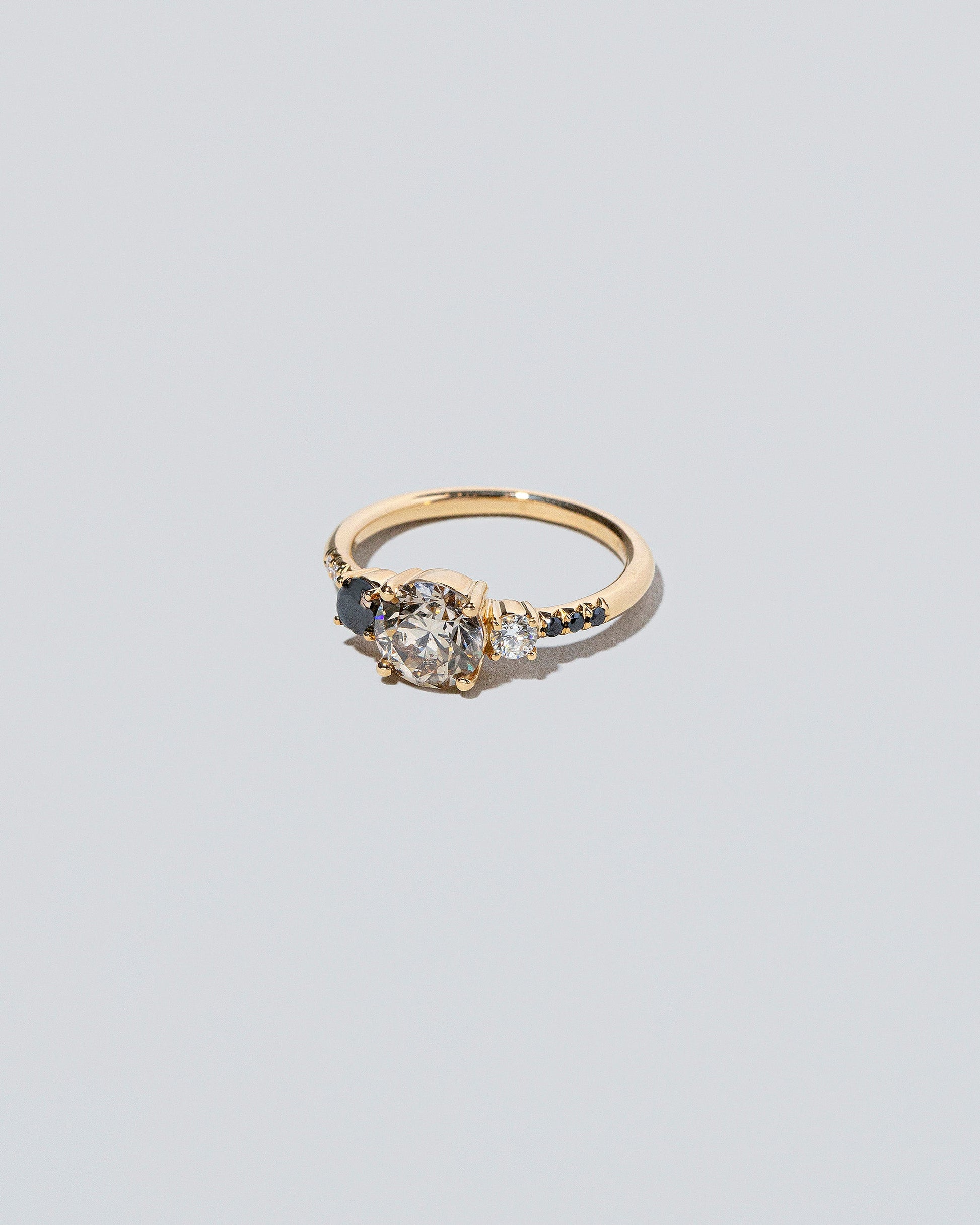 Orion Ring - Champagne Diamond on light color background.