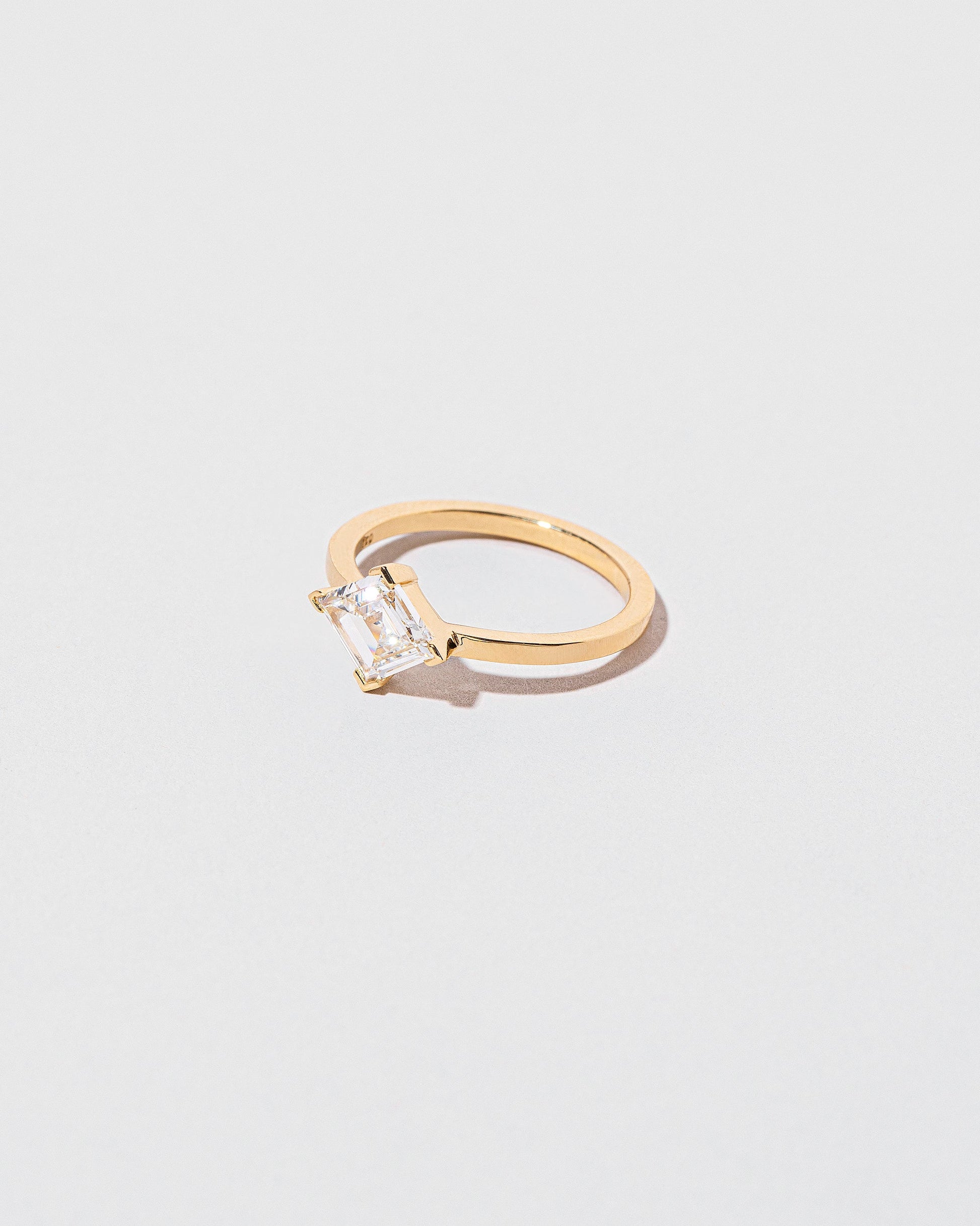 View from the side of the Paradox Ring on light color background.