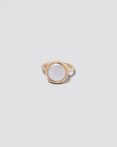 Atlas Ring on light color background.