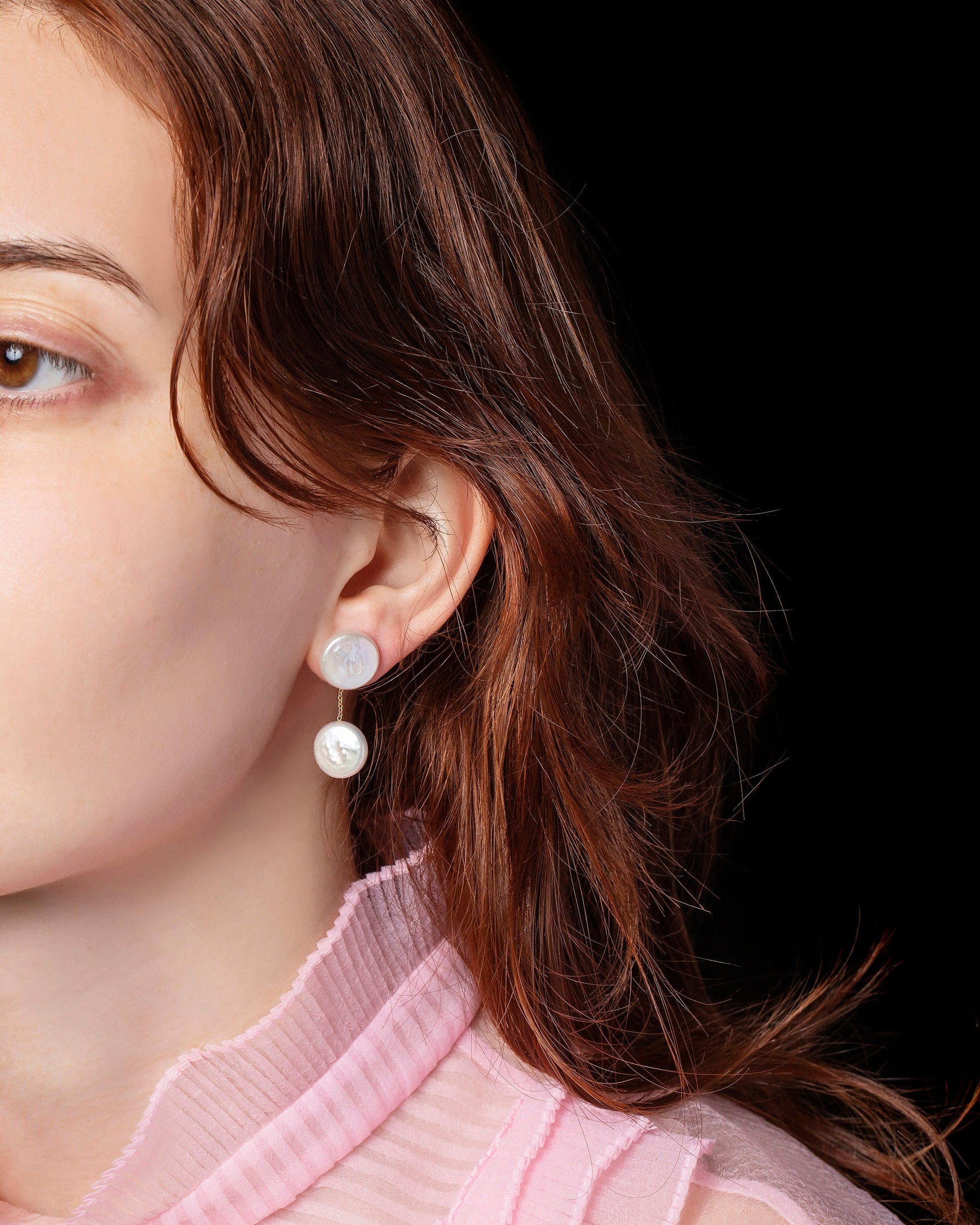 Atlas Earrings on model.