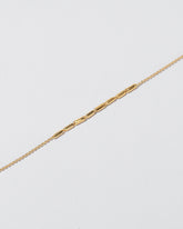  Inclusion Bracelet on light color background.