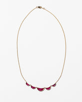 Invincibility Necklace on light colored background