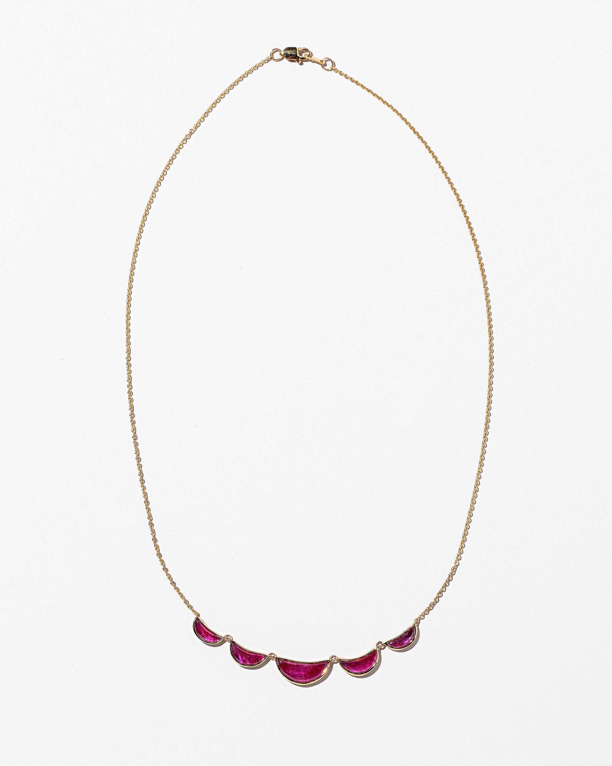 Invincibility Necklace on light colored background