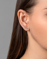 Crescent Ear Climber Studs on model.