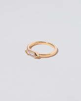 View from the side of the Paradise Ring on light color background.