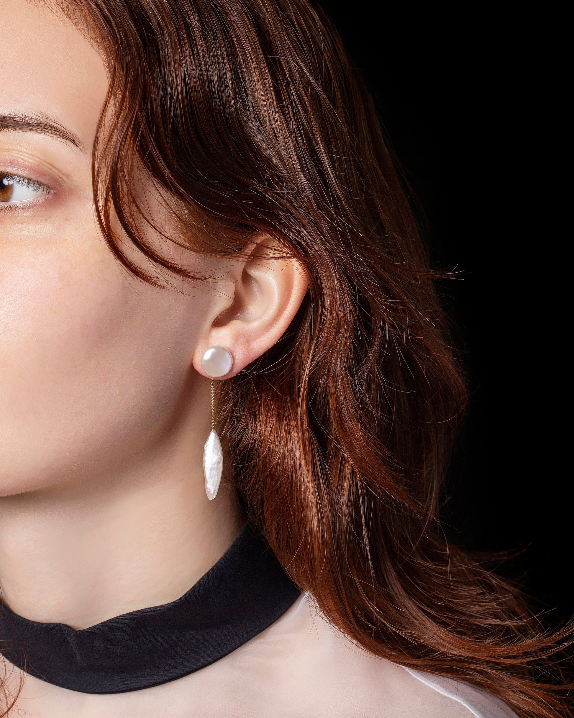 Triton Earrings on model.