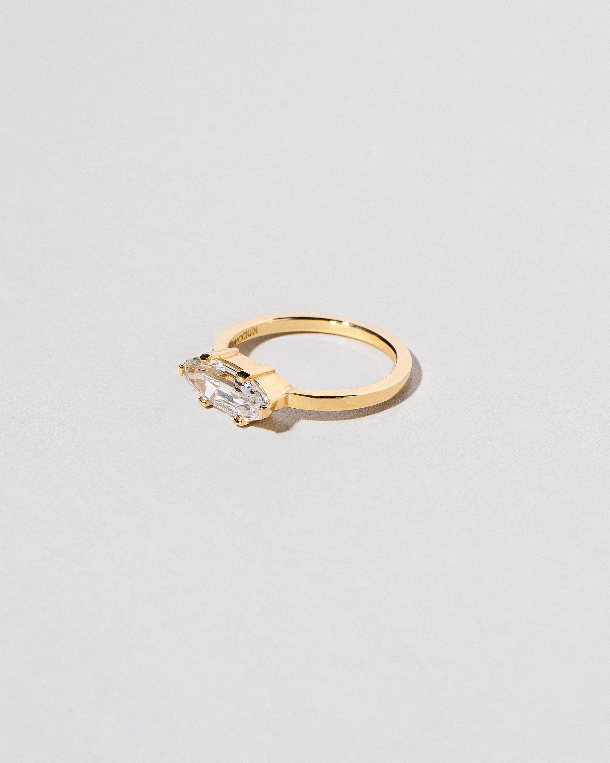 View from the side of the Columba Ring on light color background.