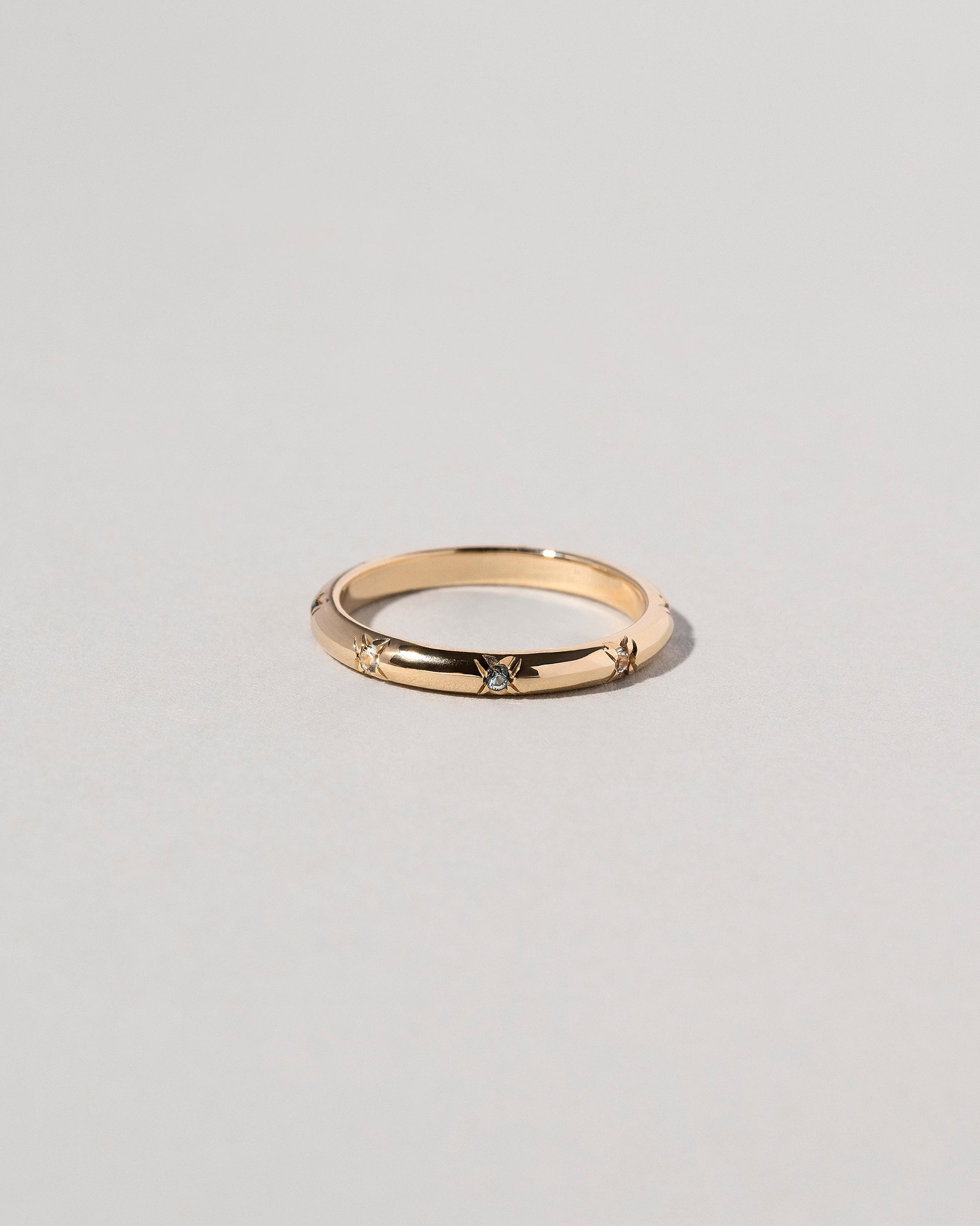  Half Round Studded Band on light color background.