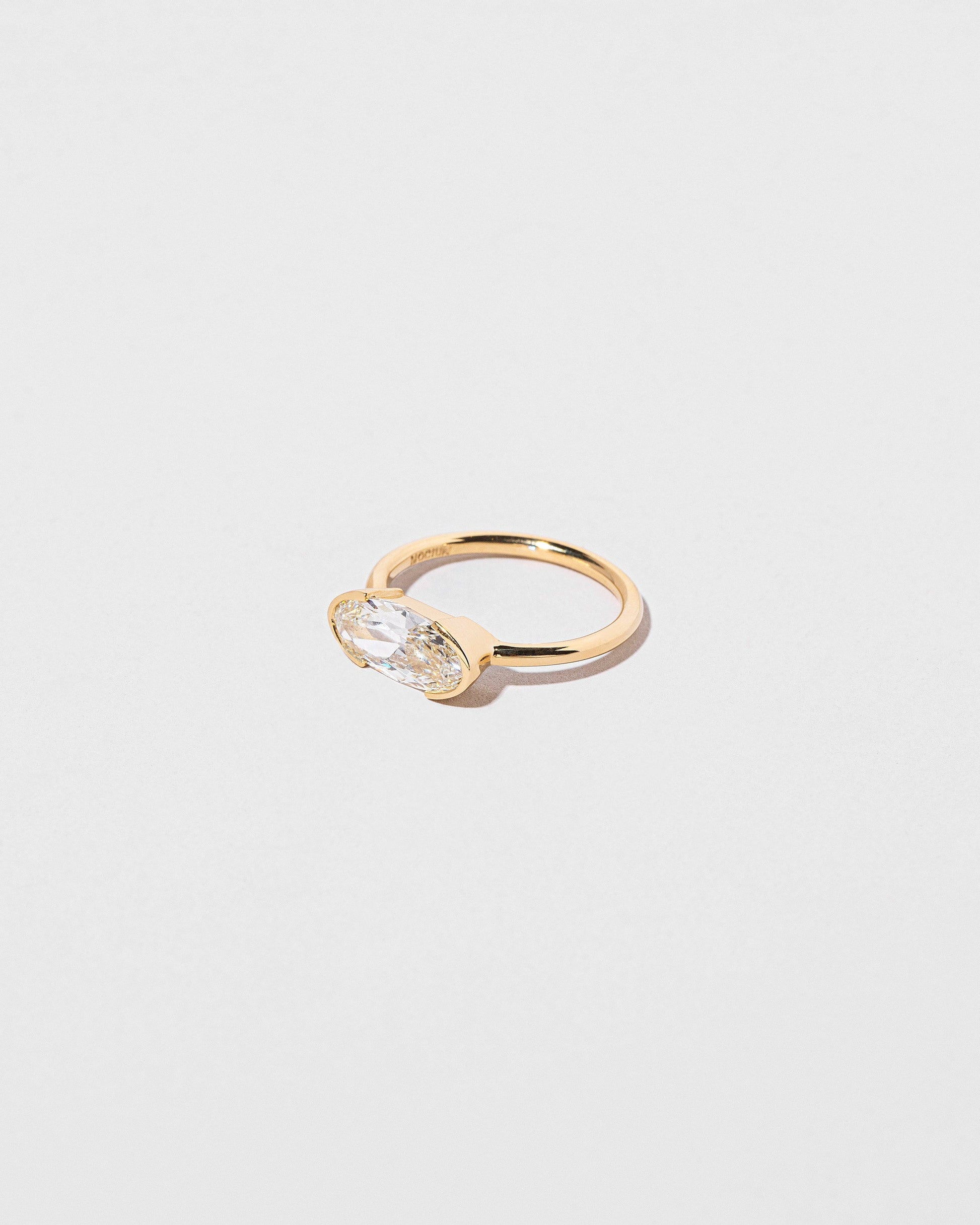 View from the side of the Eternal Ring on light color background.