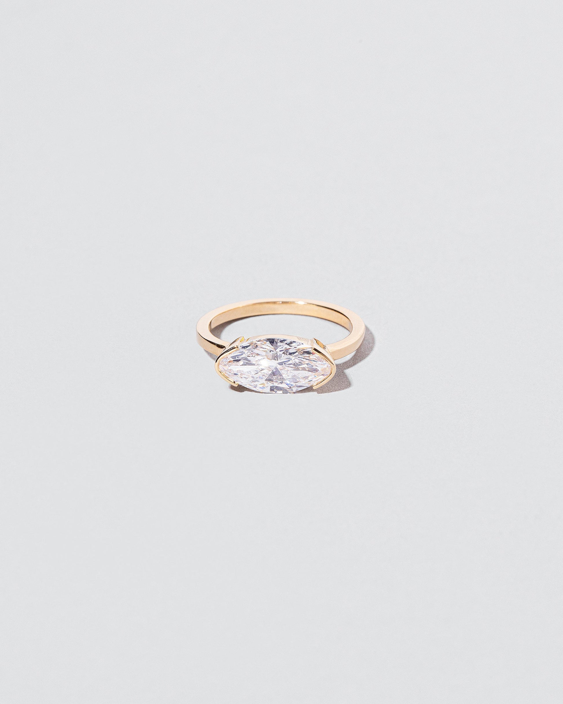 Symmetry Ring on light color background.