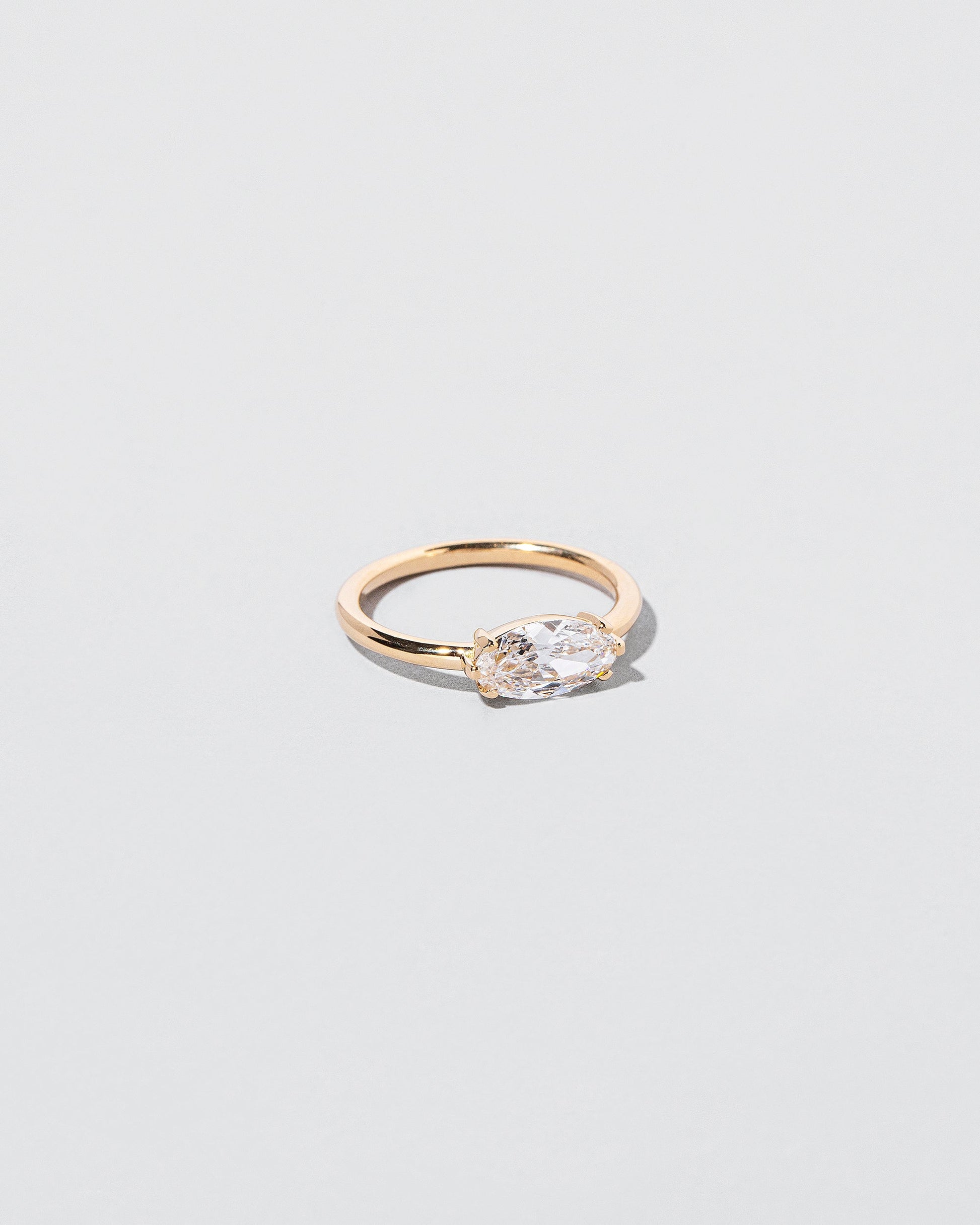  Elixer Ring on light color background.