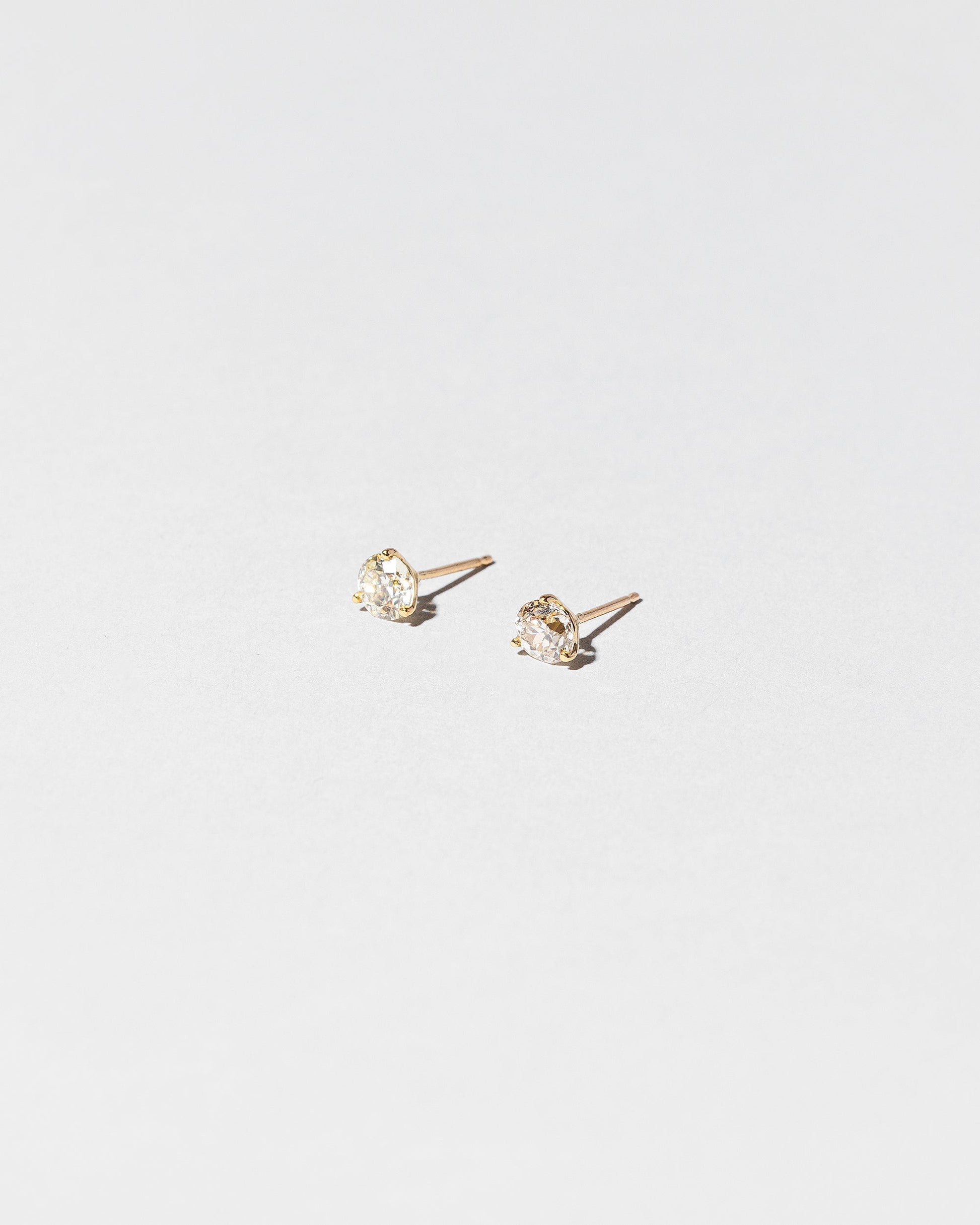  Martini Studs - White Diamond on light color background.