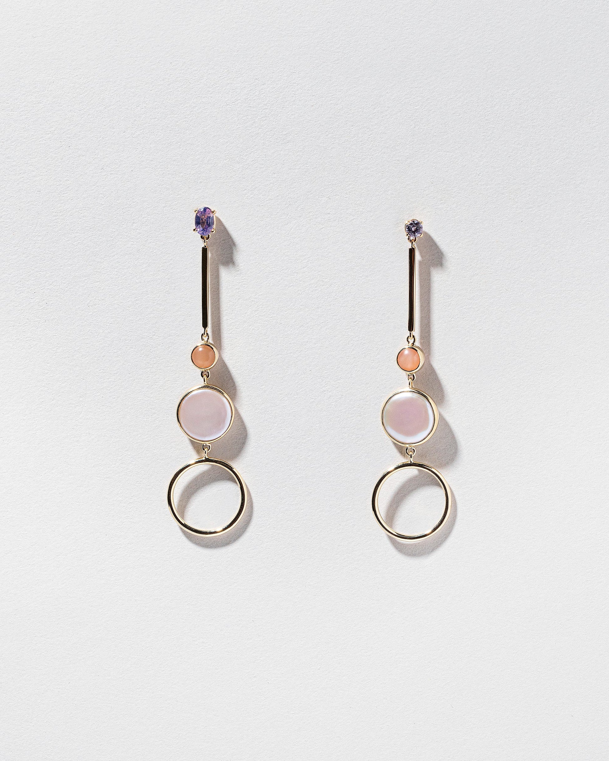  Act 3. Earrings on light color background.
