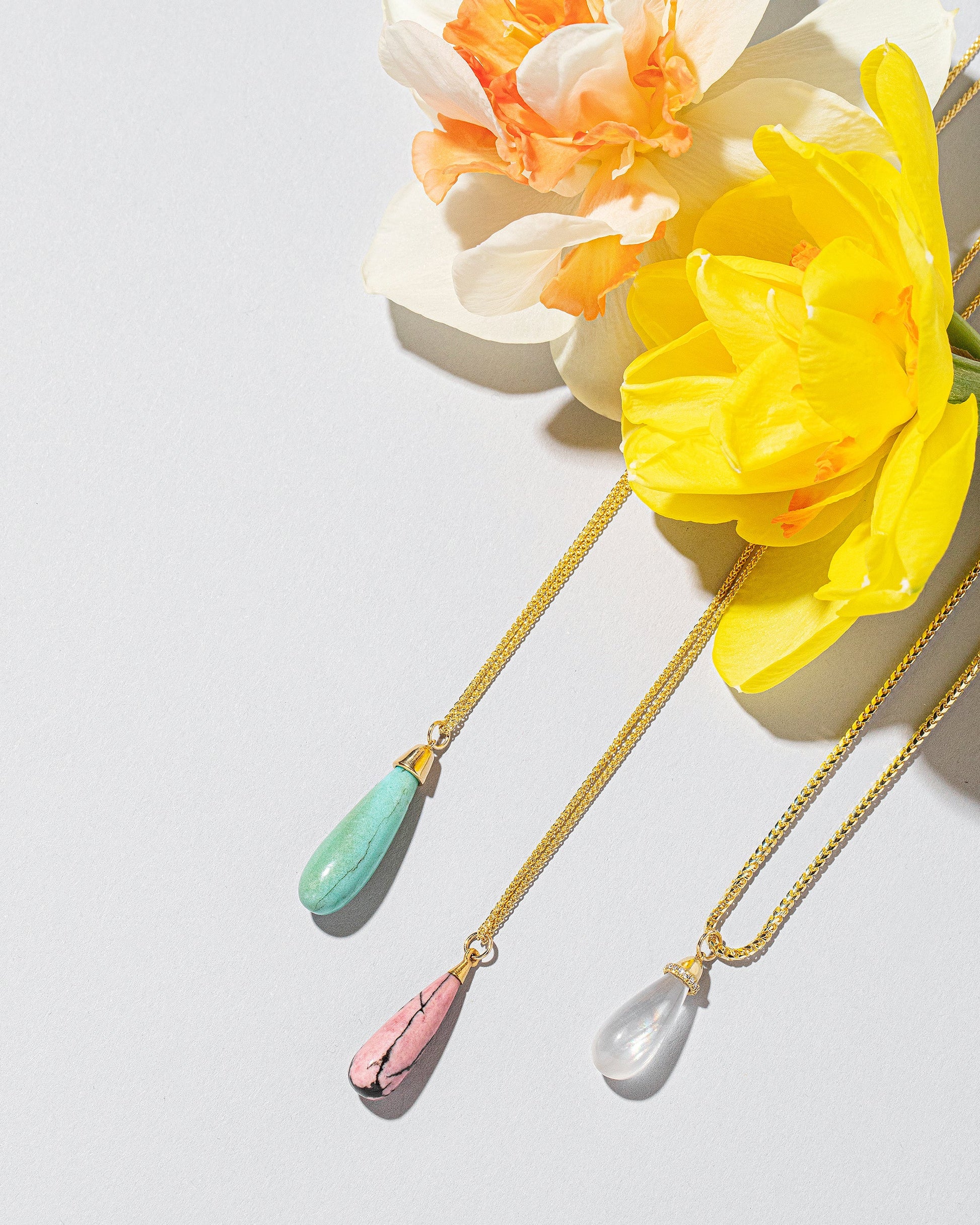  Moonstone Drop Pendant on light color background.