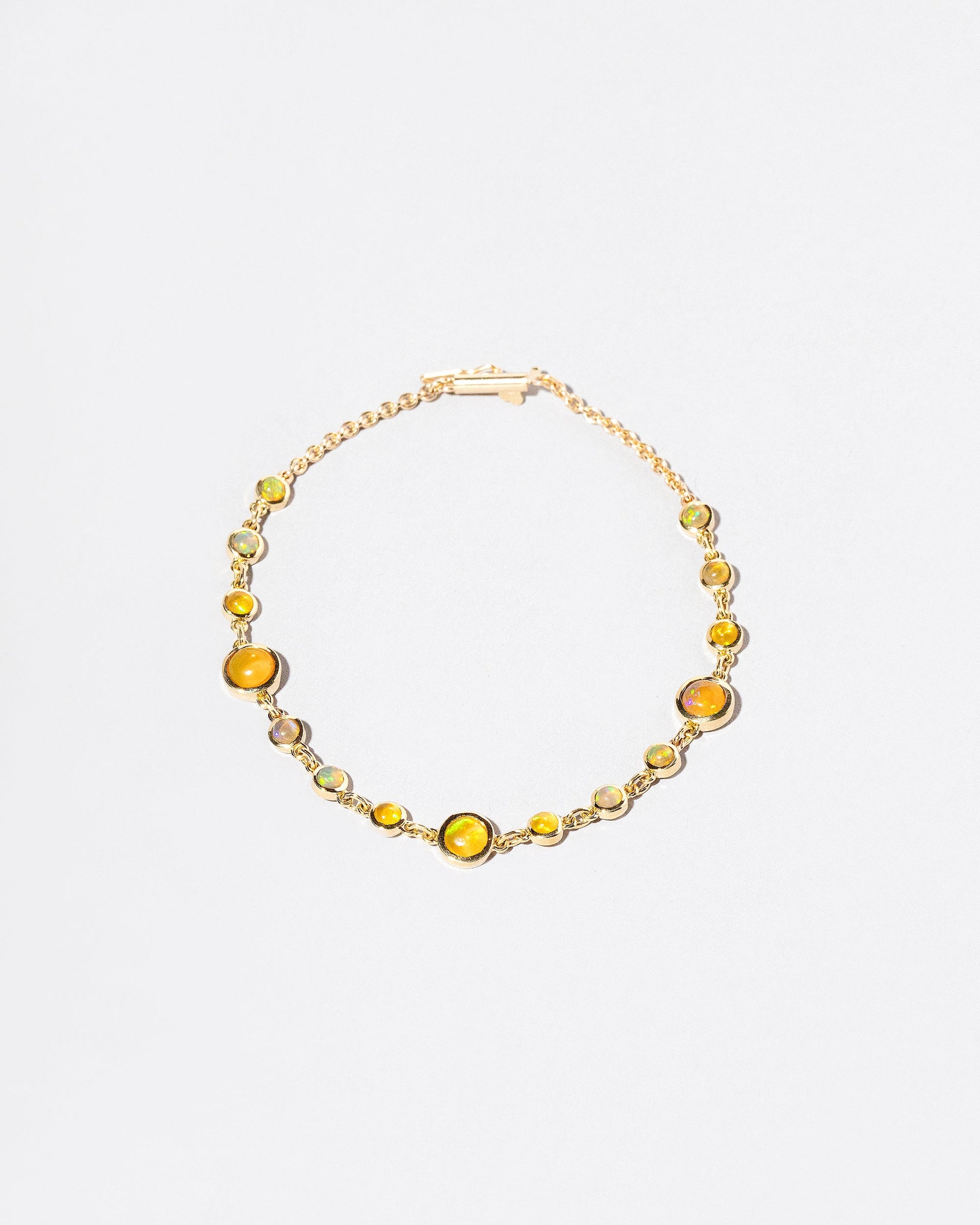  Ops Bracelet on light color background.