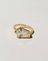 Modified Step Cut Diamond Ring on light color background.