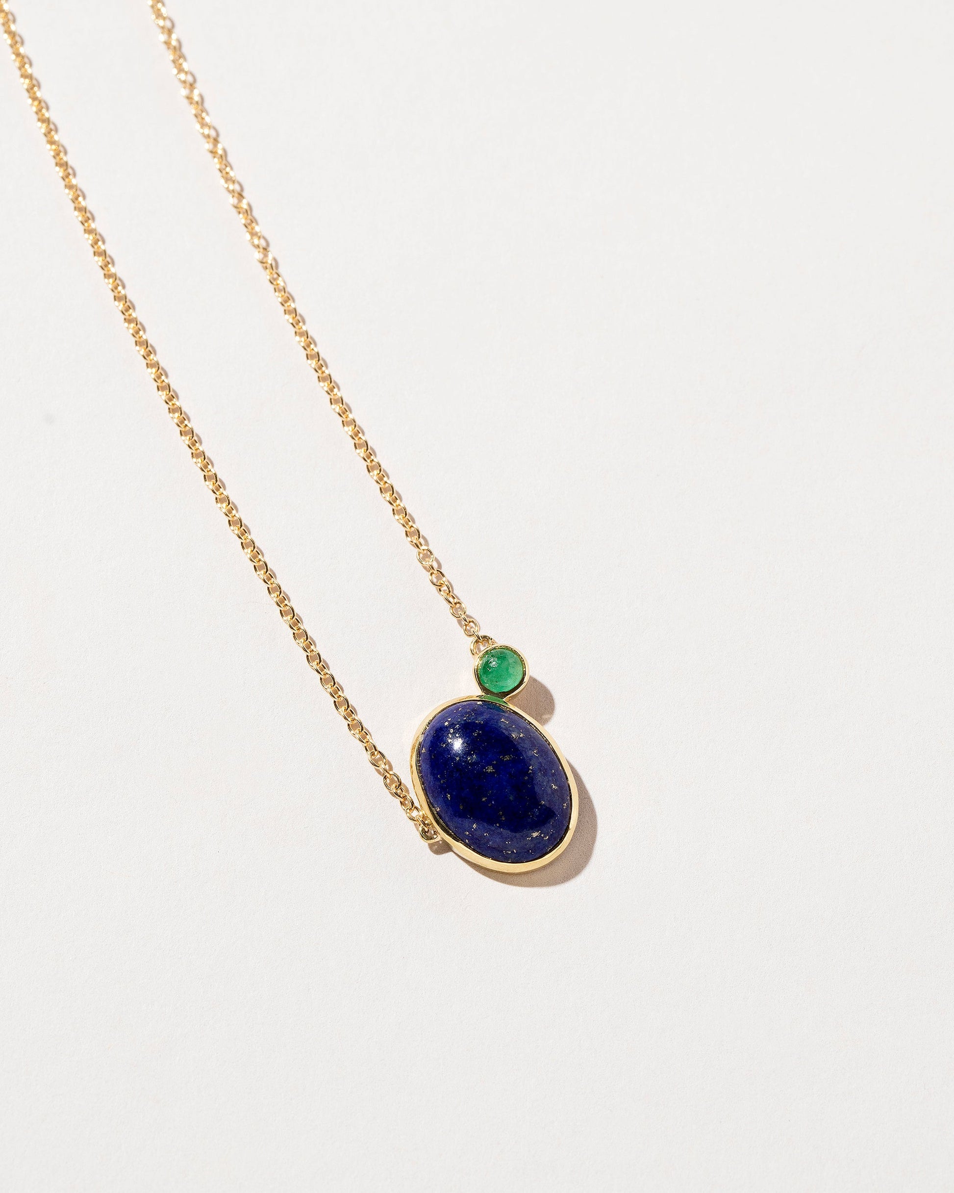  Lapis & Emerald Pendant Necklace on light color background.