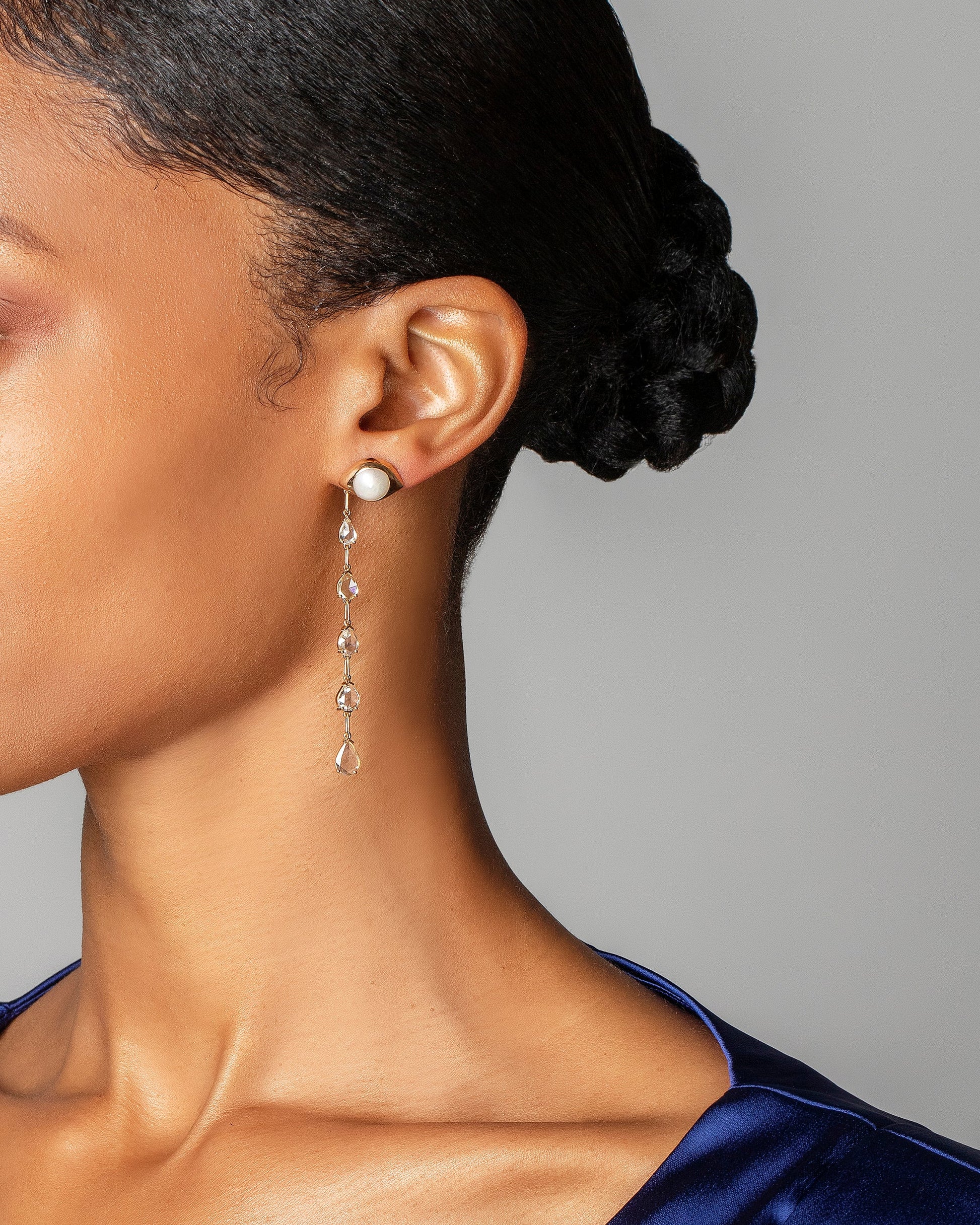 Pearl Transformation Earrings on model.