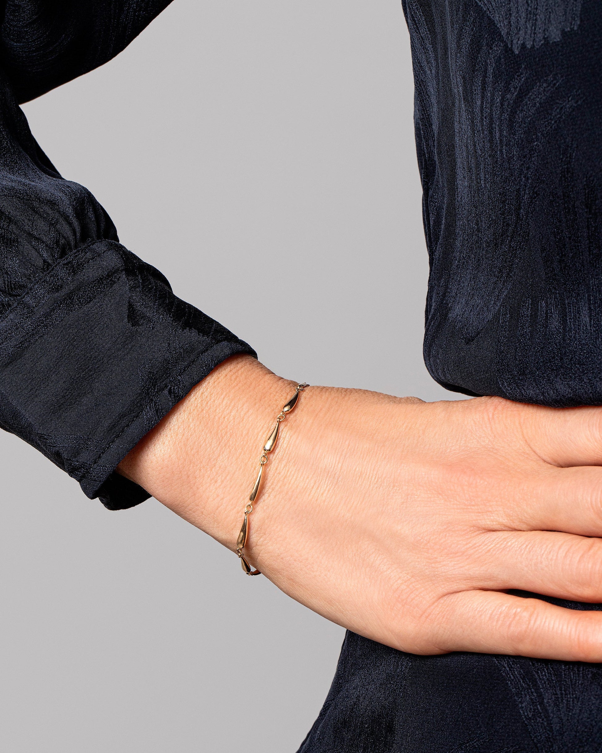 Accumulation Bracelet on model.