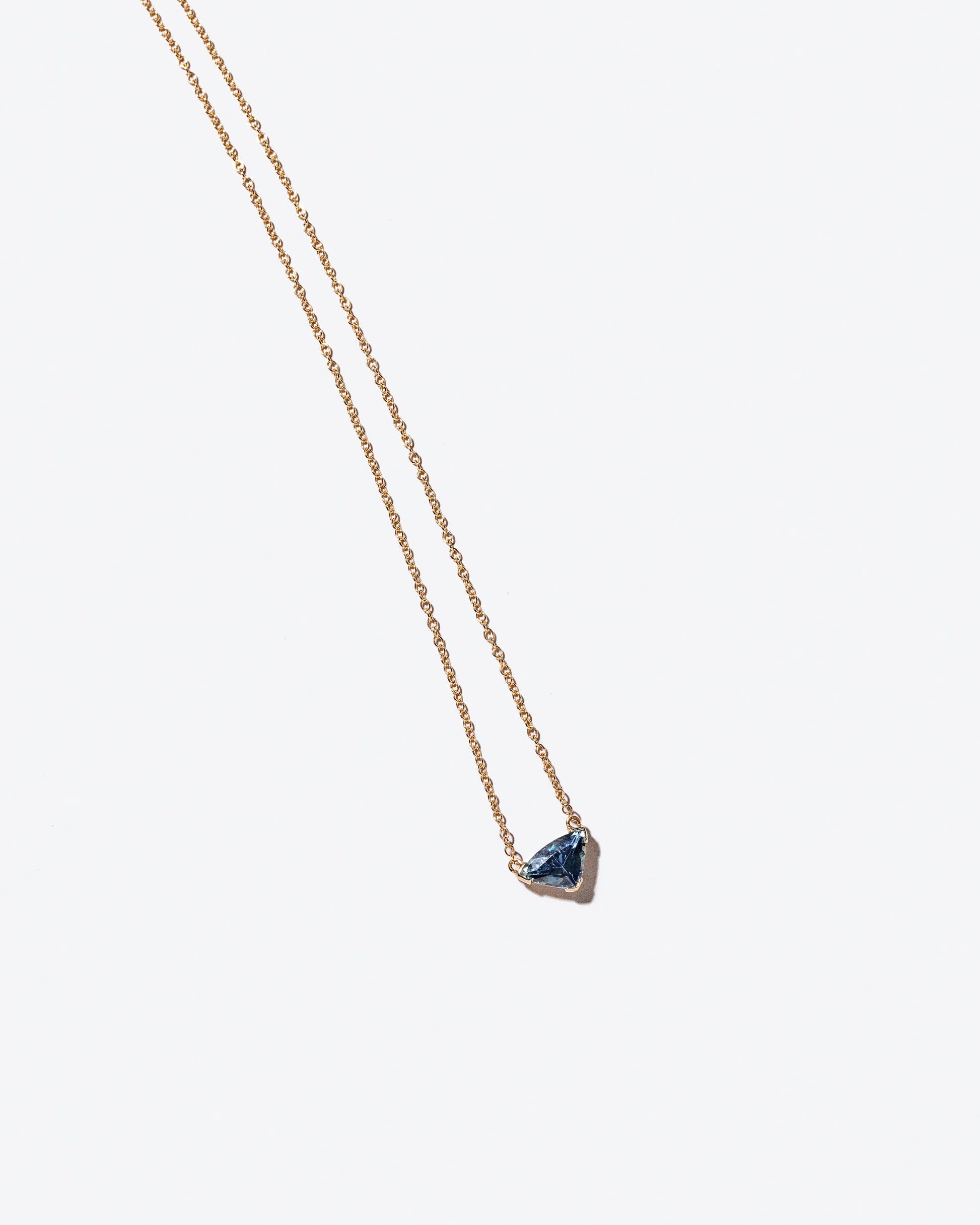 Product photo of Gil Necklace on a light color background 