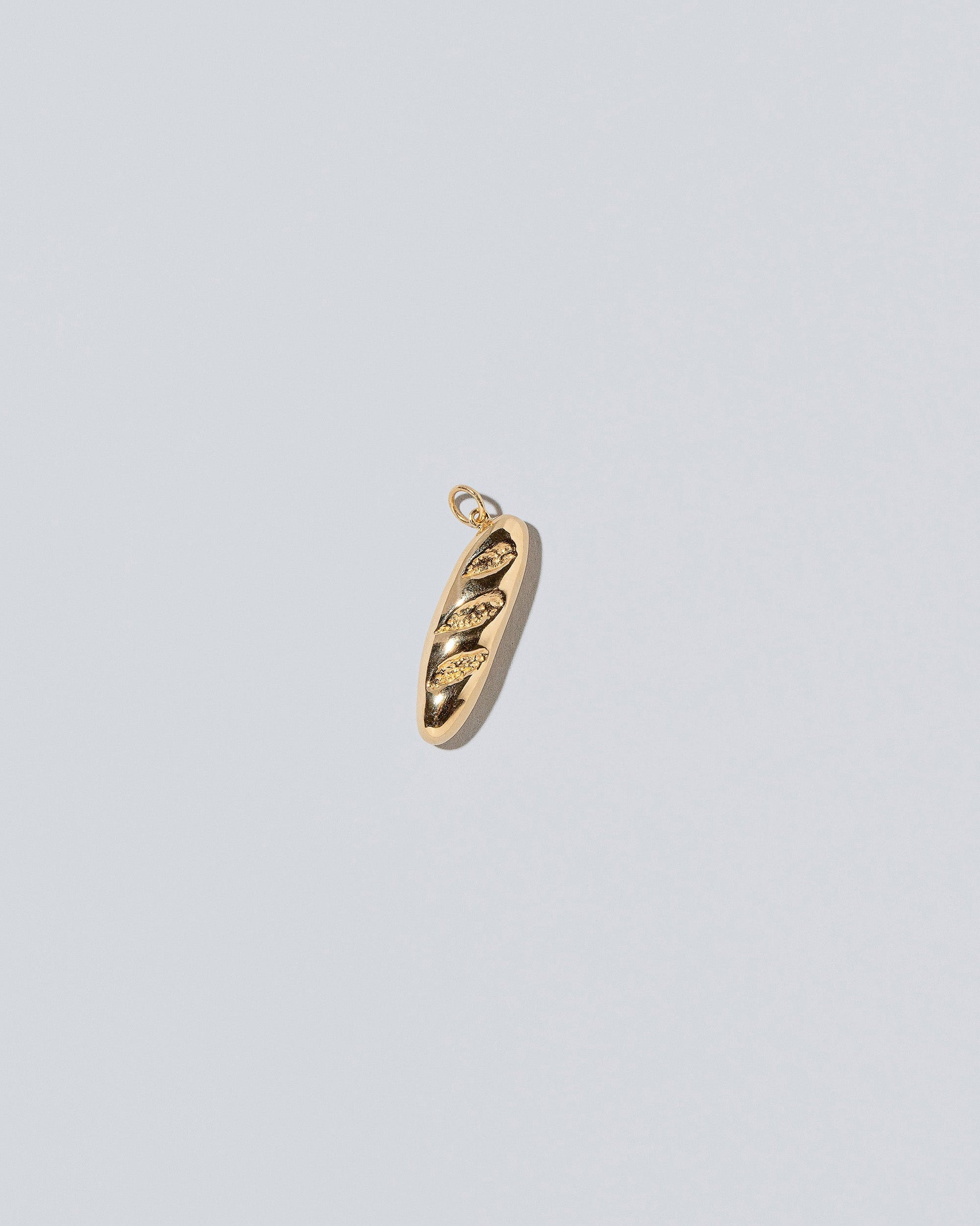 Demi Baguette Charms on light color background.