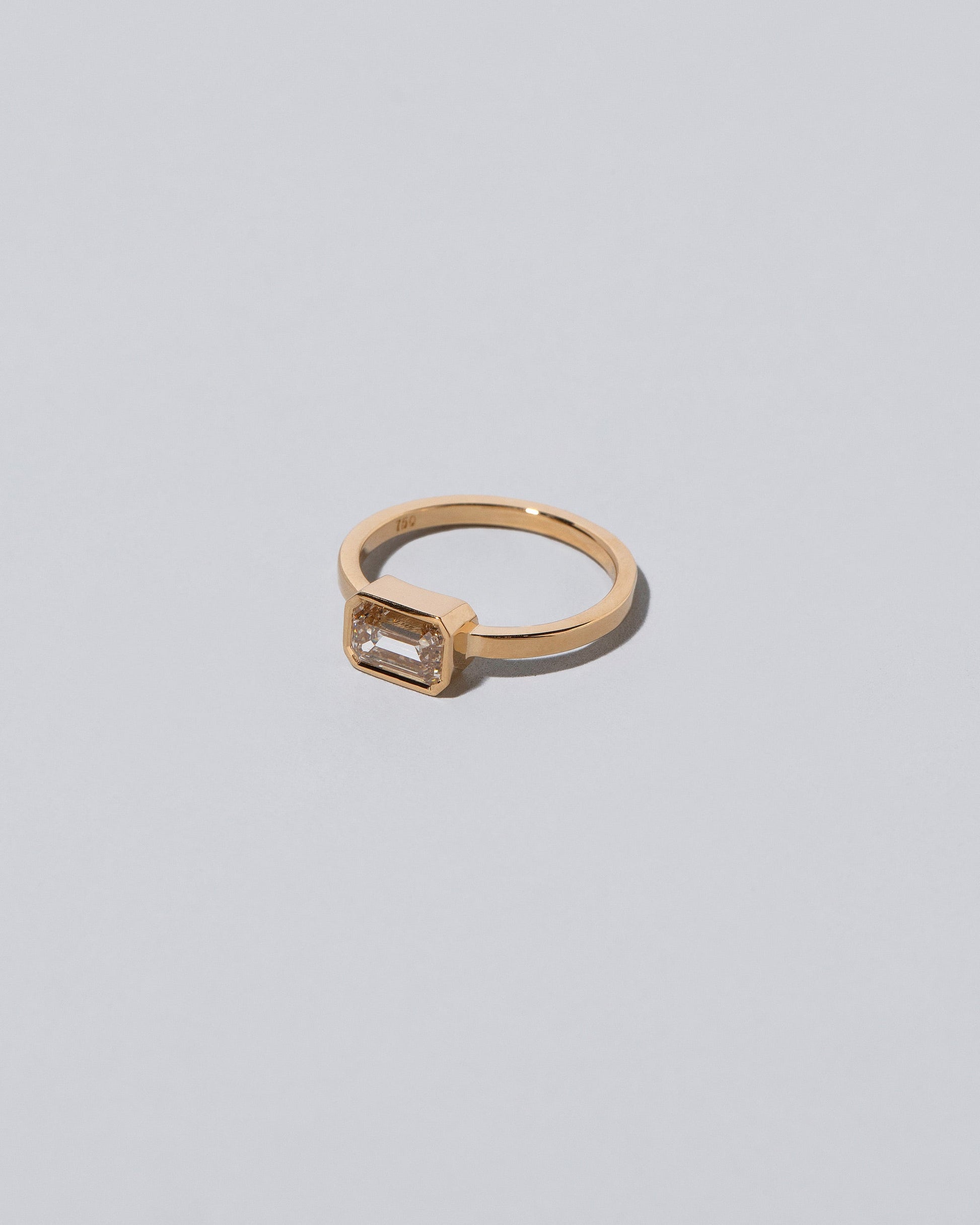 View from the side of the Spectrum Ring on light color background.