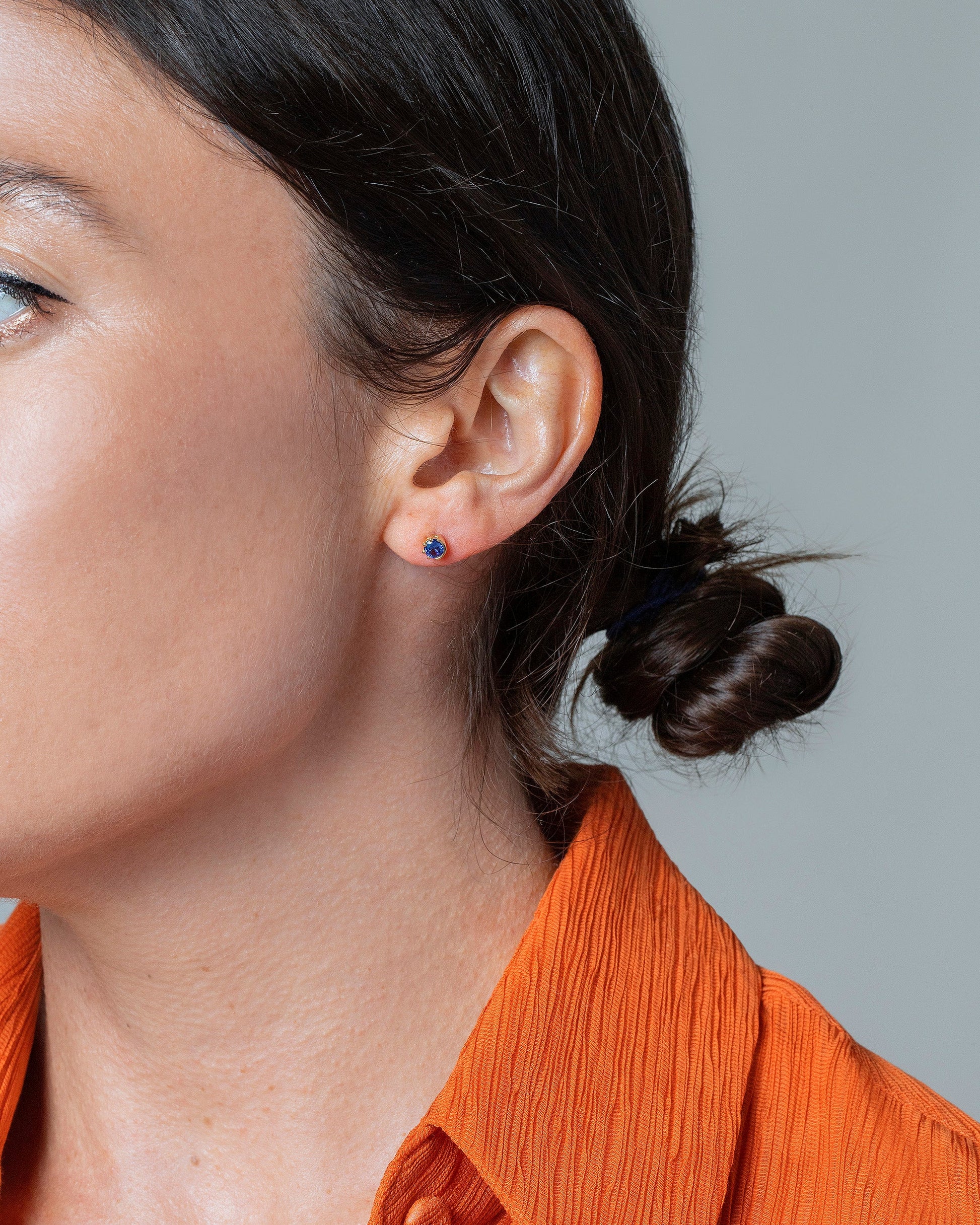 Sapphire Sun & Moon Stud Earrings on model.