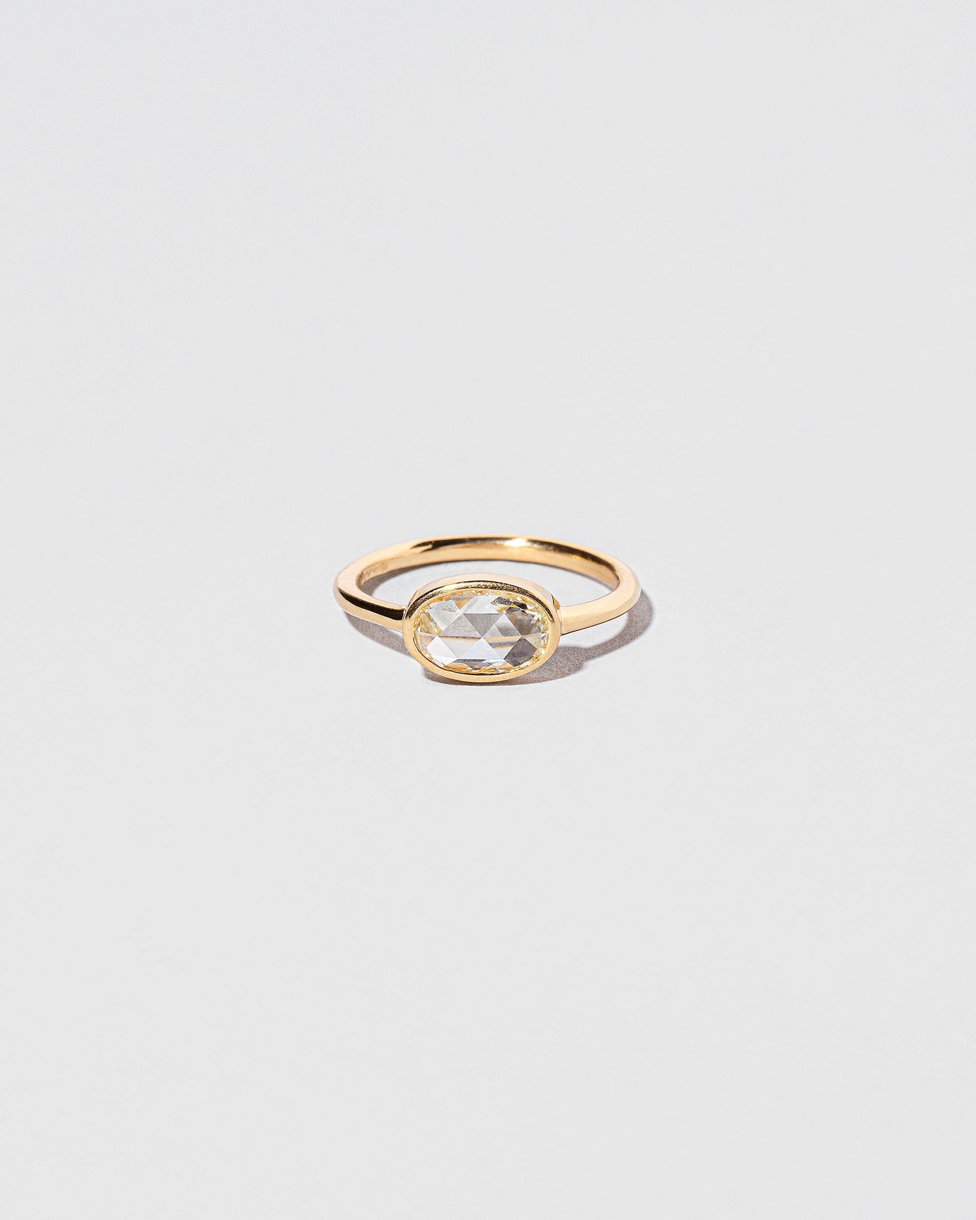 Moly Ring on light color background.