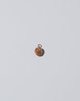 Cinnamon Roll Charm - Enamel  on light colored background