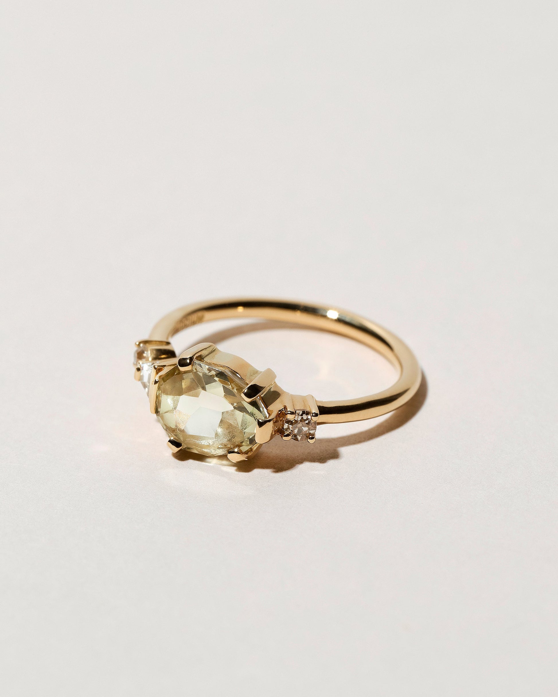  Light Green Grossular Garnet Cluster Ring on light color background.